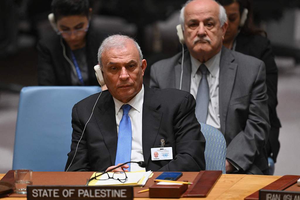 Ziad Abu-Amr (L), member of the Palestinian Legislative Council, and Palestinian Ambassador to the UN Riyad Mansour (R) listen during a UN Security Council meeting on the situation in the Middle East, including the Palestinian issue, at the UN headquarters in New York City, April 18, 2024. /CFP