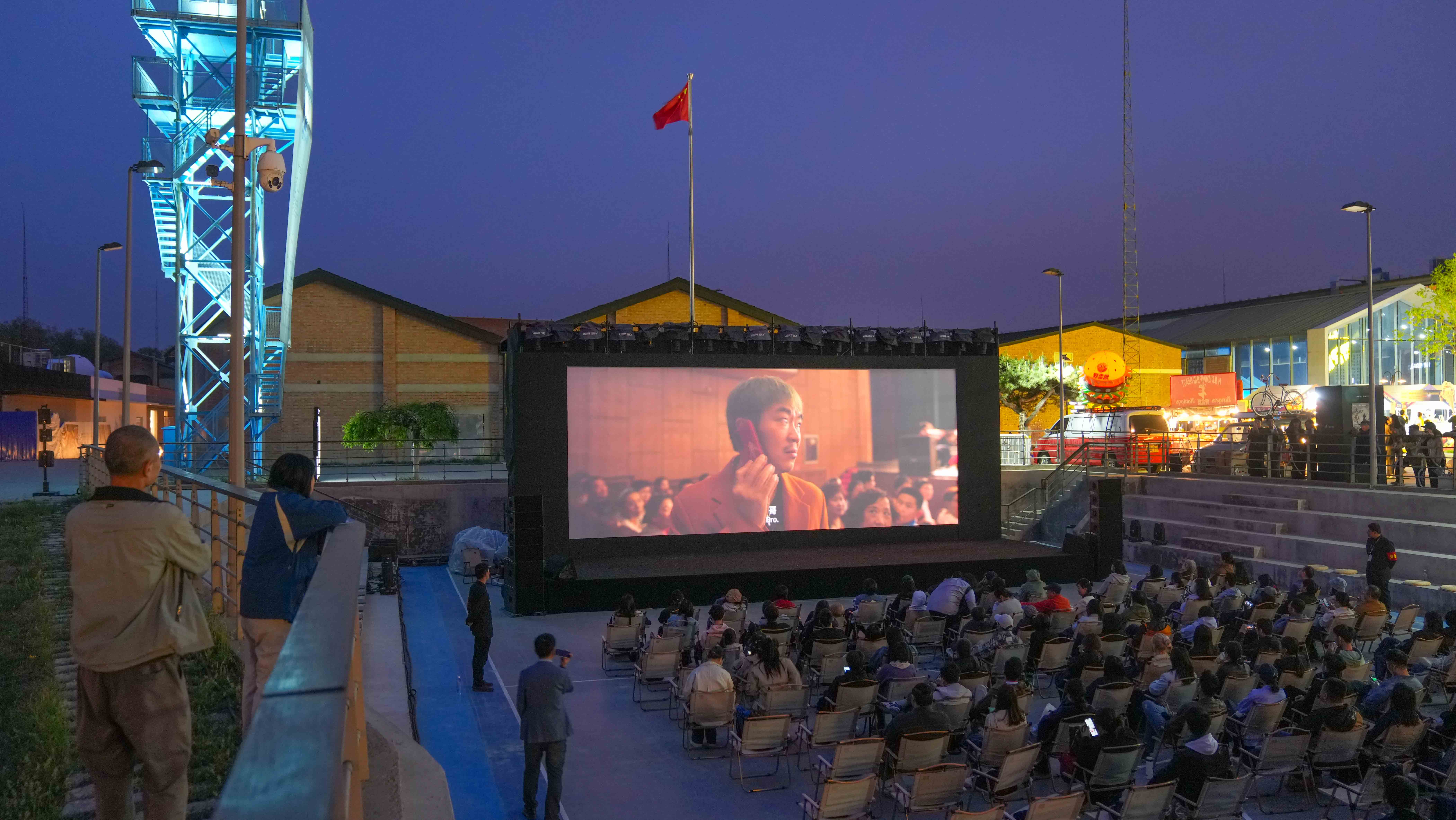 Film lovers participate outdoor movie screening at The Station in Beijing, April 19, 2024. Chen Bo/CGTN