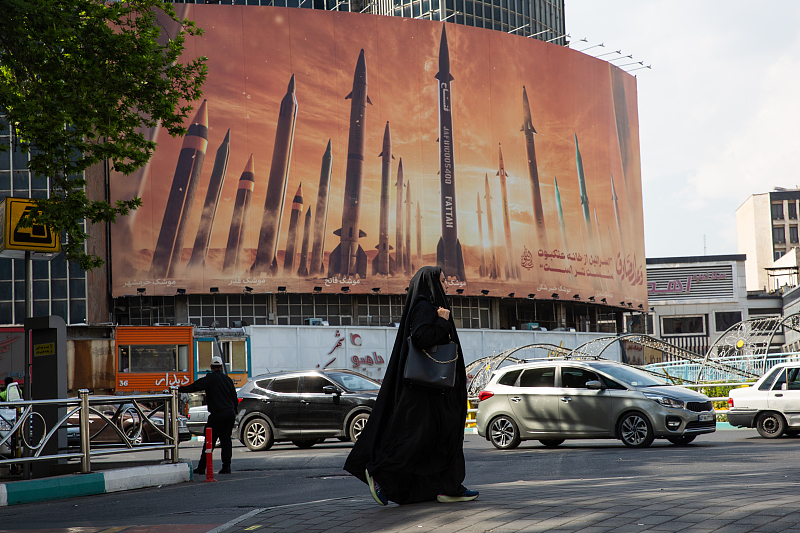 A large billboard depicting Iranian missiles is displayed on a Tehran major square, Iran, April 19, 2024. /CFP