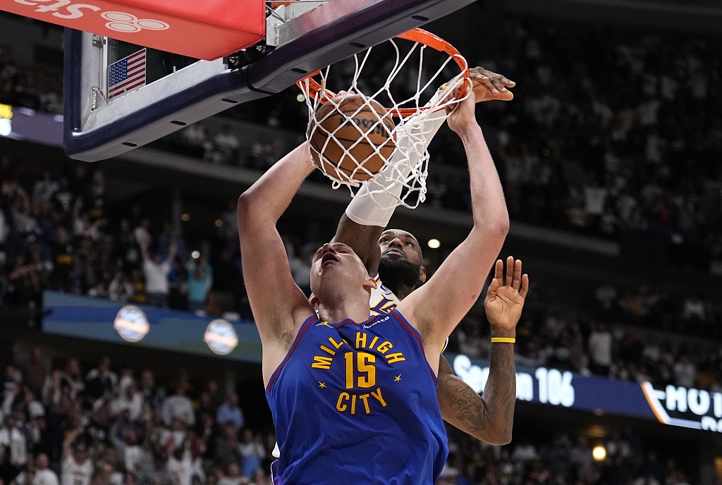 Nikola Jokic (#15) of the Denver Nuggets dunks in Game 1 of the NBA Western Conference first-round playoffs against the Los Angeles Lakers at Ball Arena in Denver, Colorado, April 20, 2024. /CFP