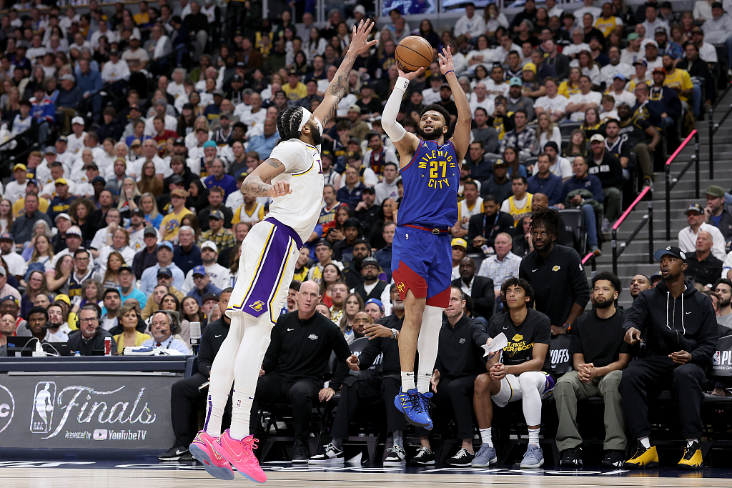 Jamal Murray (R) of the Denver Nuggets shoots in Game 1 of the NBA Western Conference first-round playoffs against the Los Angeles Lakers at Ball Arena in Denver, Colorado, April 20, 2024. /CFP