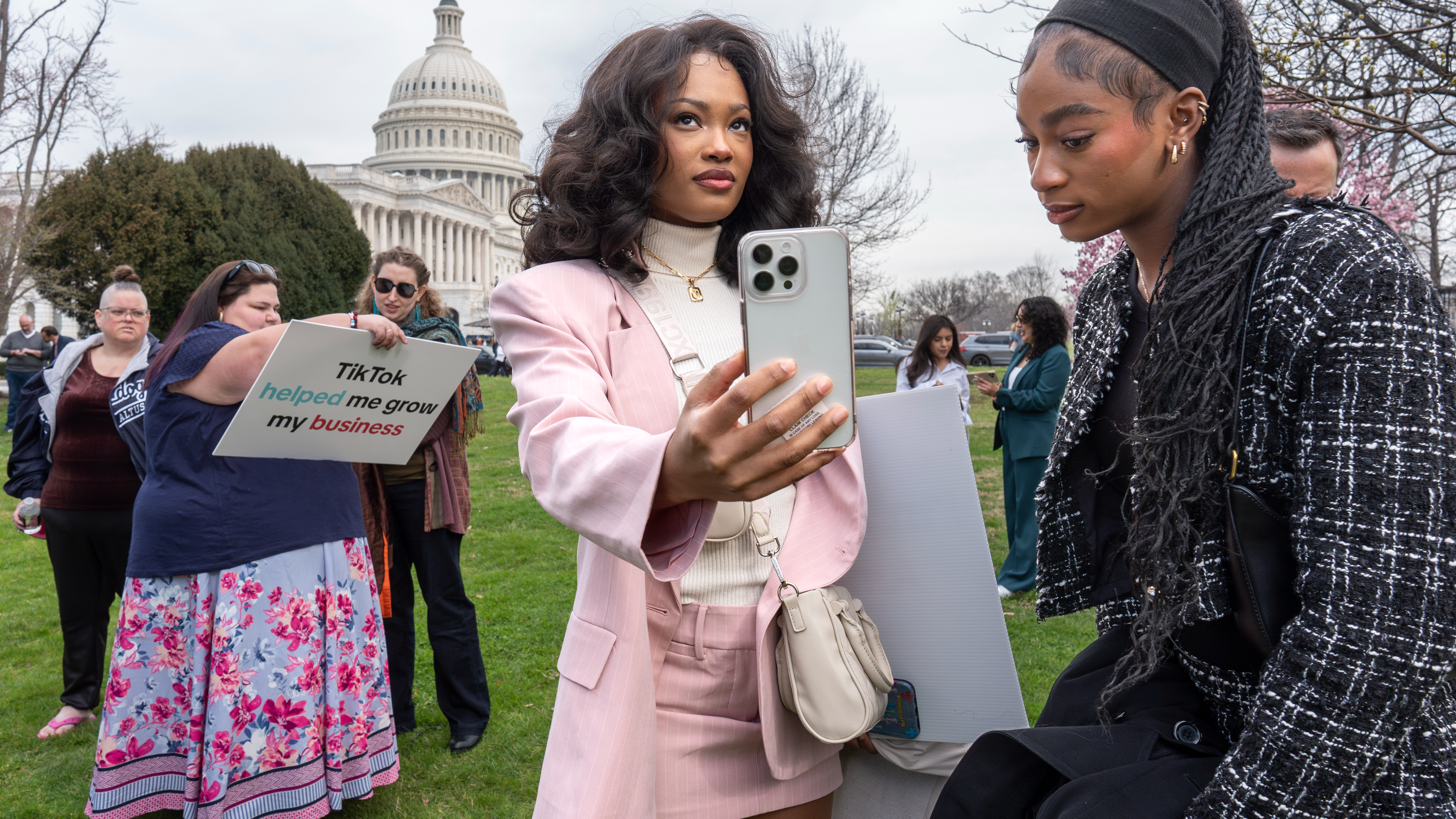 Devotees of TikTok monitor voting at the Capitol in Washington, D.C., as the House passed a bill that would lead to a nationwide ban of the video app if its China-based owner doesn't sell, March 13, 2024. /AP
