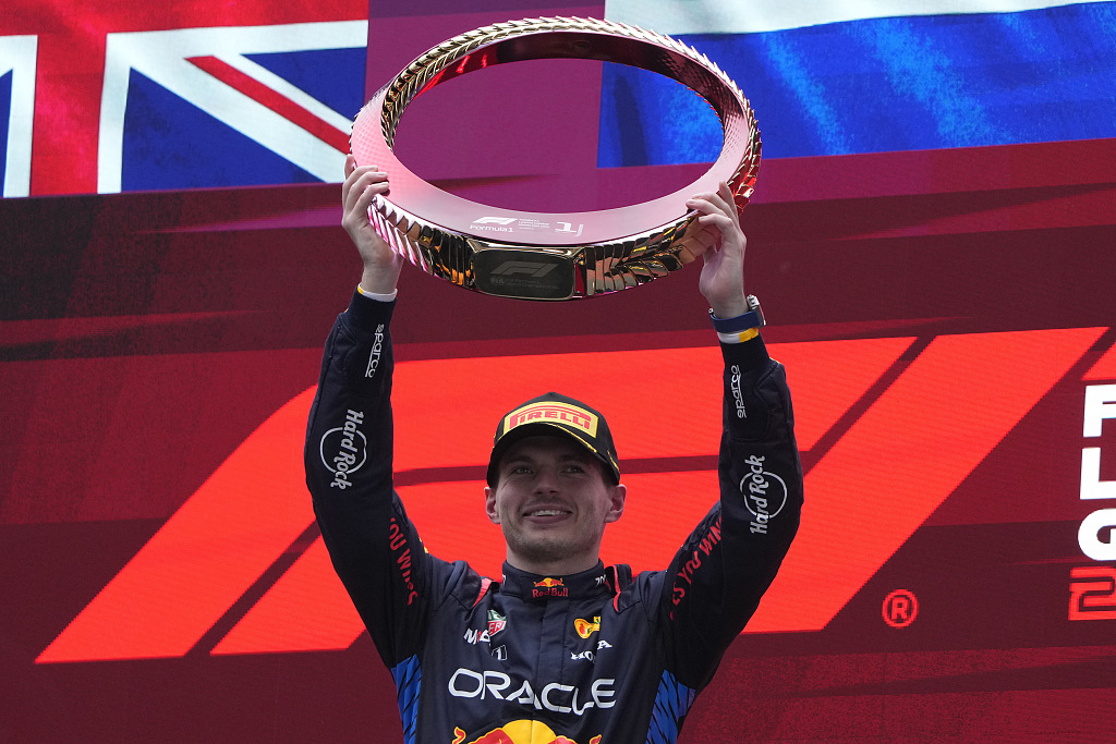 Max Verstappen of Red Bulls celebrates with the trophy after winning the Formula 1 Chinese Grand Prix in east China's Shanghai Municipality, April 21, 2024. /CFP