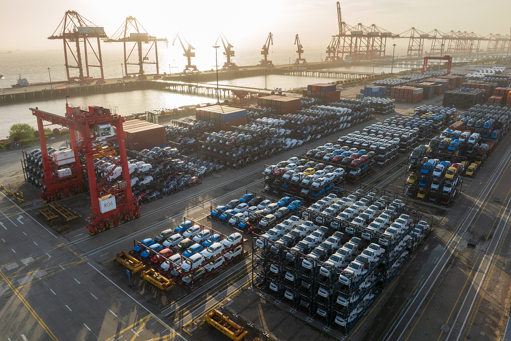 At Suzhou's Taicang Port International container terminal, China's Jiangsu Province, a large number of new energy vehicles are being shipped worldwide, April 19, 2024. /CFP
