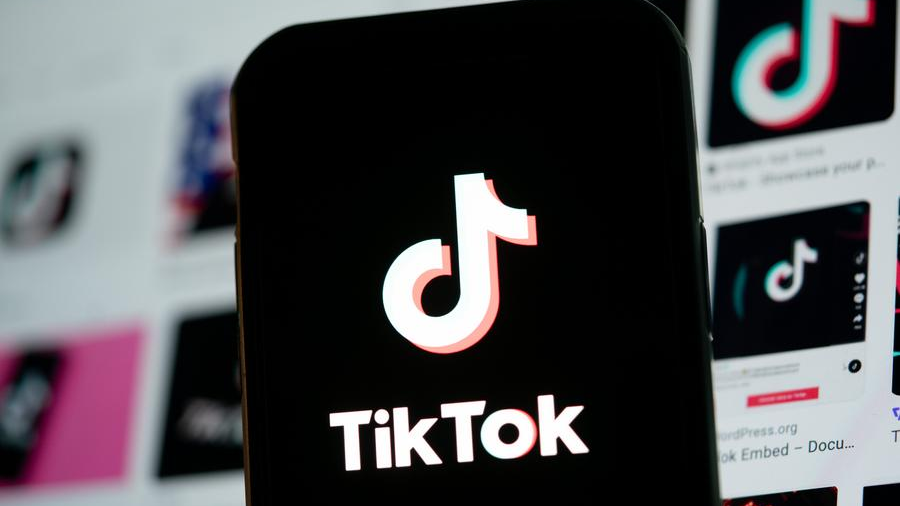The logo of TikTok is seen on the screen of a smartphone in Arlington, Virginia, the United States, March 13, 2024. /Xinhua