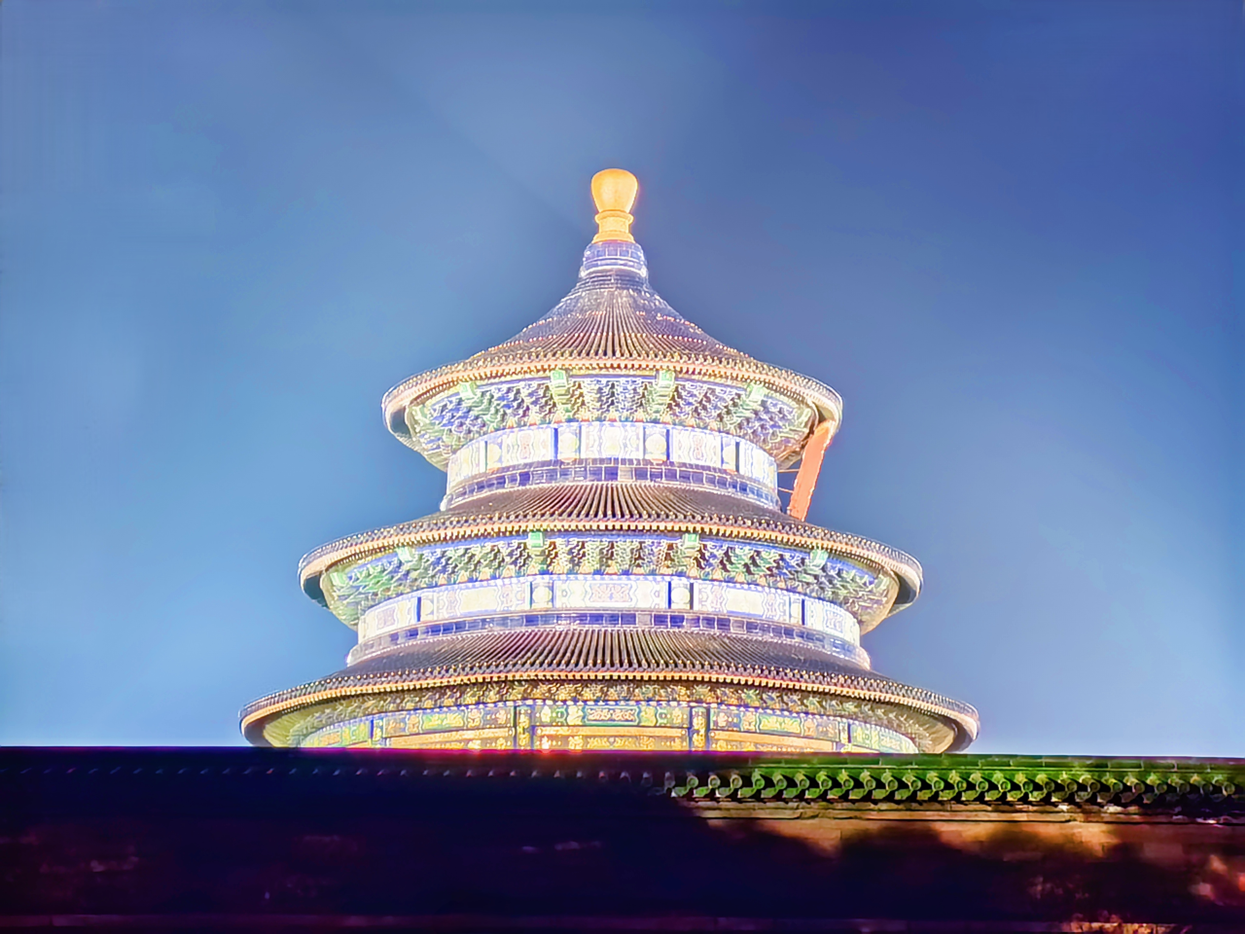The Hall of Prayer for Good Harvests at the Temple of Heaven is seen illuminated in Beijing, on April 5, 2024. /CGTN