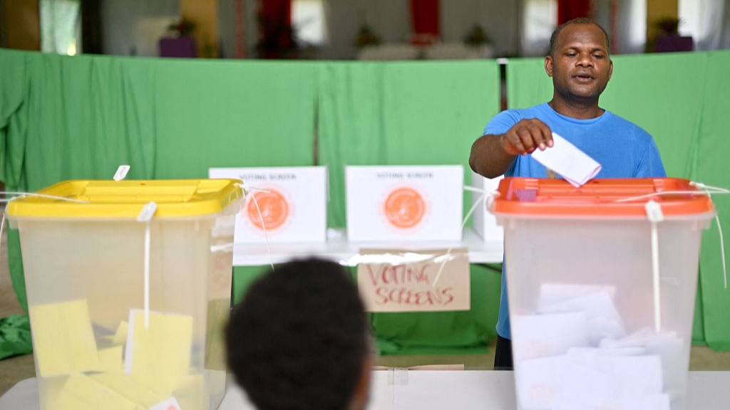 A man drops his ballot paper into the box during the general elections in Honiara, capital city of the Solomon Islands, April 17, 2024. /CFP