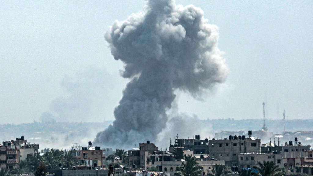 A smoke plume billows following an Israeli bombardment north of Nuseirat in the central Gaza Strip, April 23, 2024. /CFP