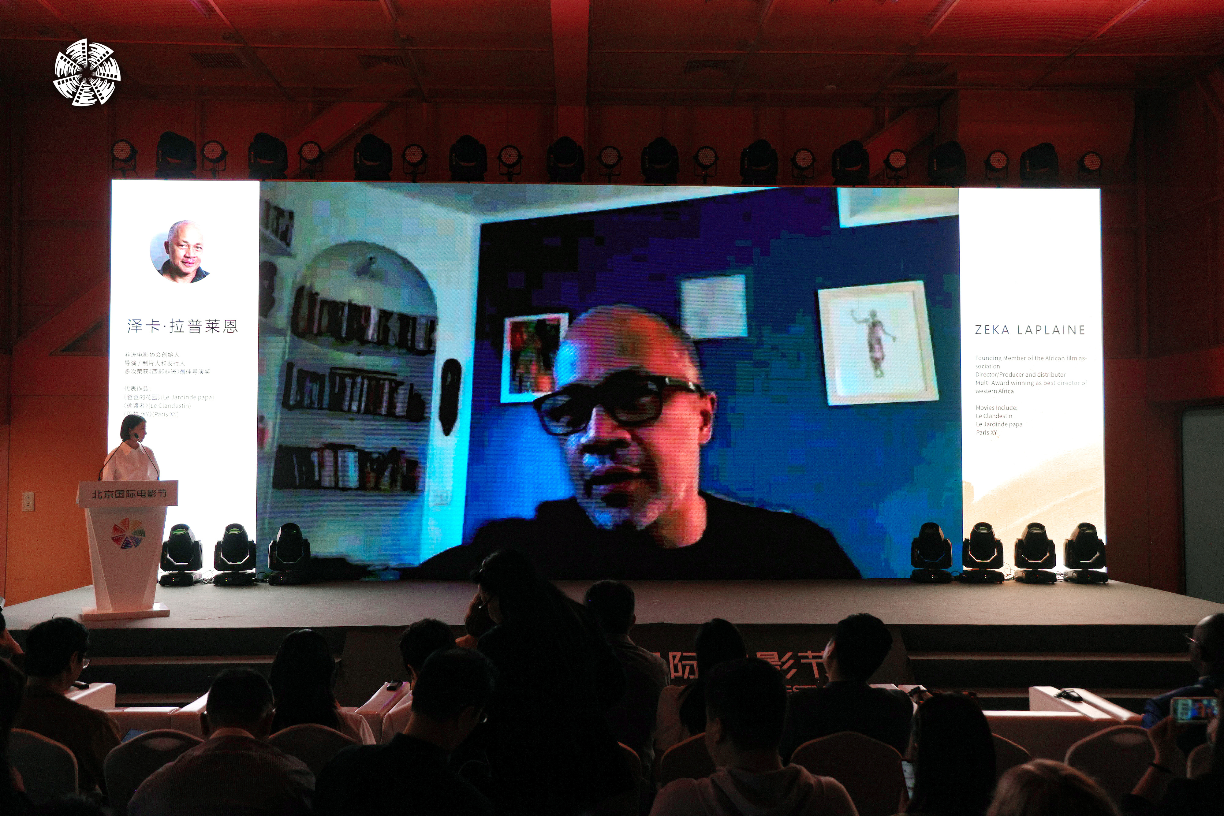 Democratic Republic of Congo-born filmmaker Zeka Laplaine appears in a video message to the attendees of the African Film Conference at the 14th Beijing International Film Festival in Beijing, April 22, 2024. /BJIFF