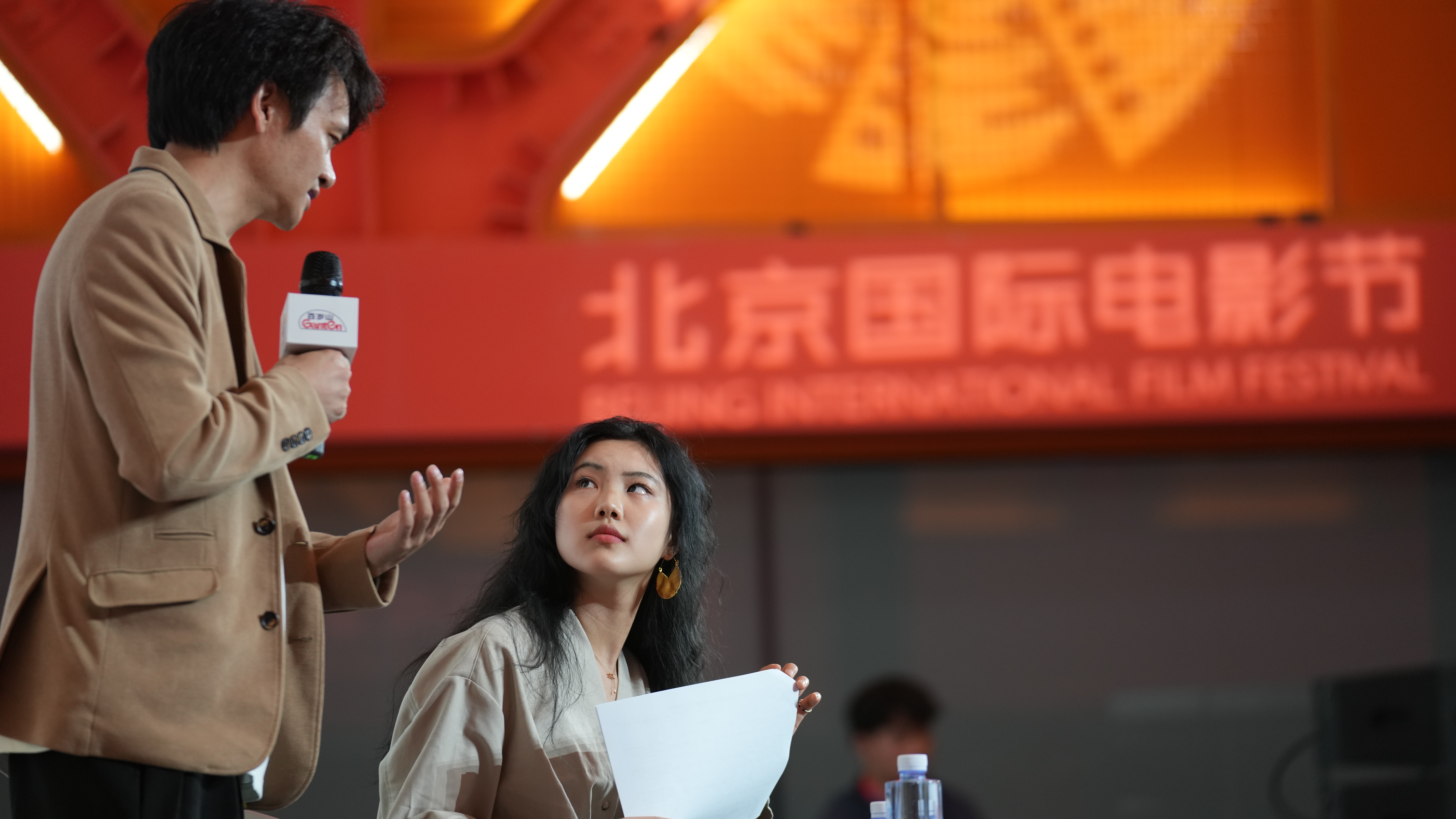 An attendee speaks during a screen acting open course of the 14th Beijing International Film Festival in Beijing, China, April 23, 2024. Chen Bo/CGTN