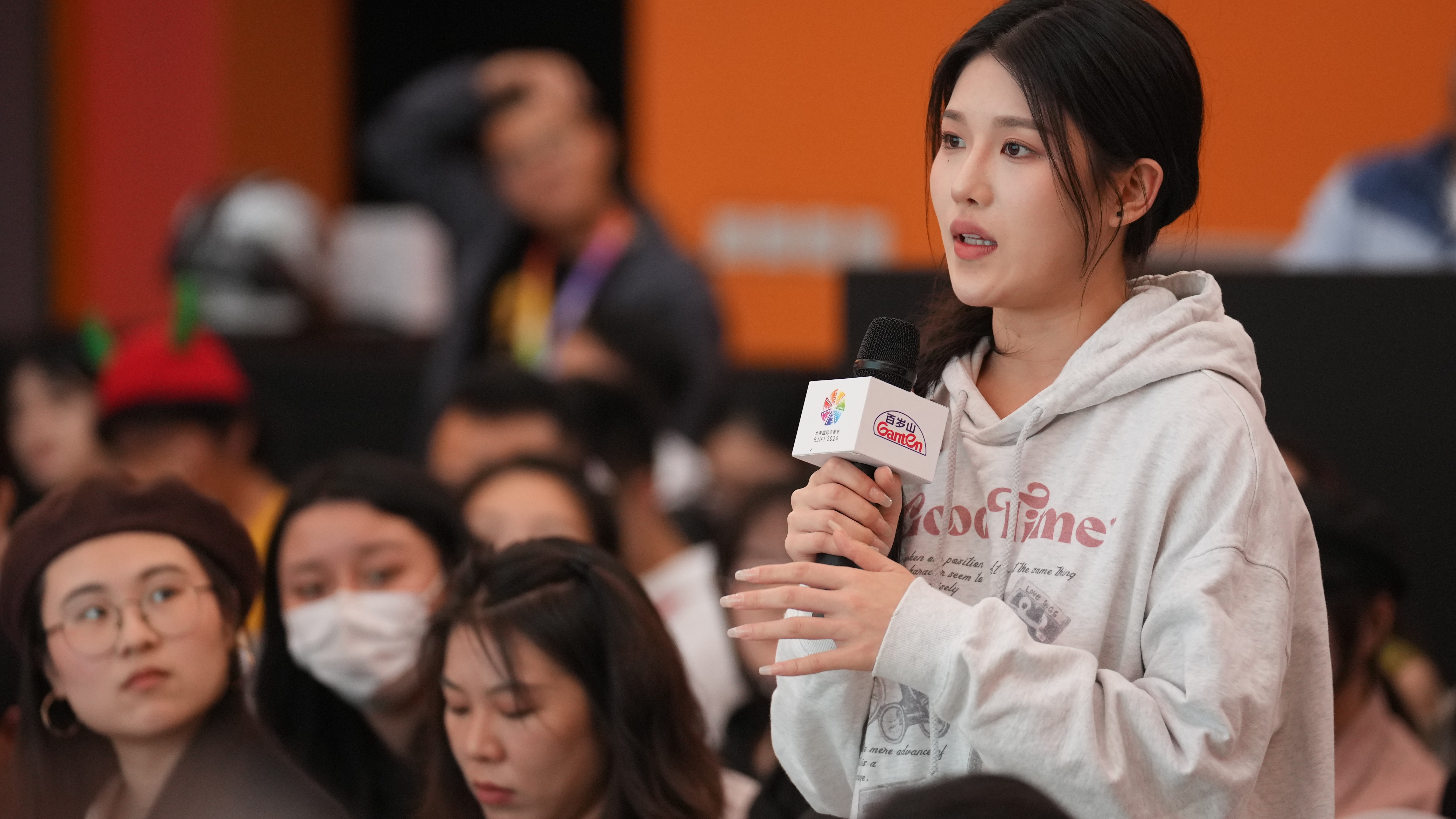 An attendee speaks during a screen acting open course of the 14th Beijing International Film Festival in Beijing, China, April 23, 2024. Chen Bo/CGTN