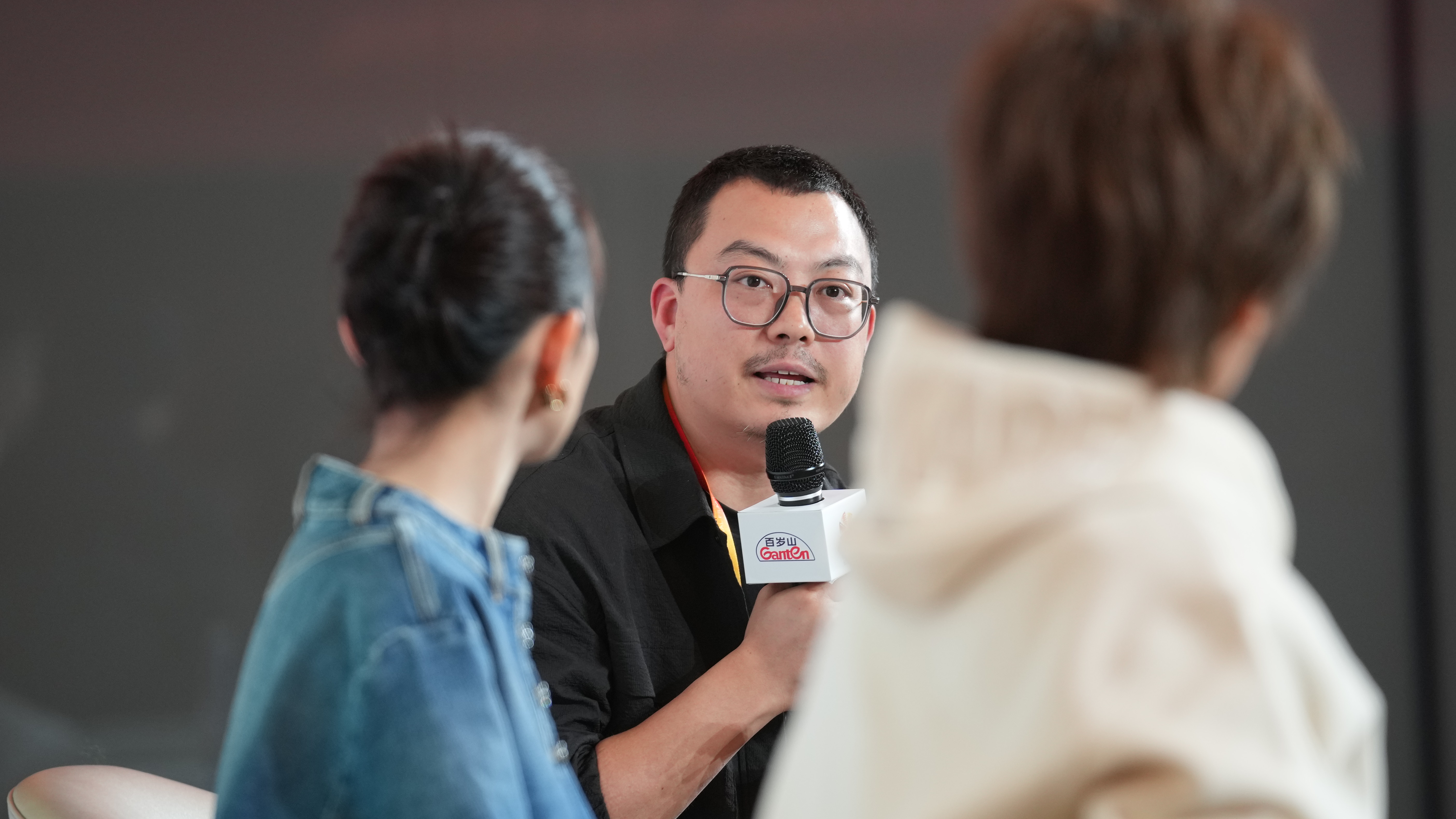 A conductor speaks during a screen acting open course of the 14th Beijing International Film Festival in Beijing, China, April 23, 2024. Chen Bo/CGTN