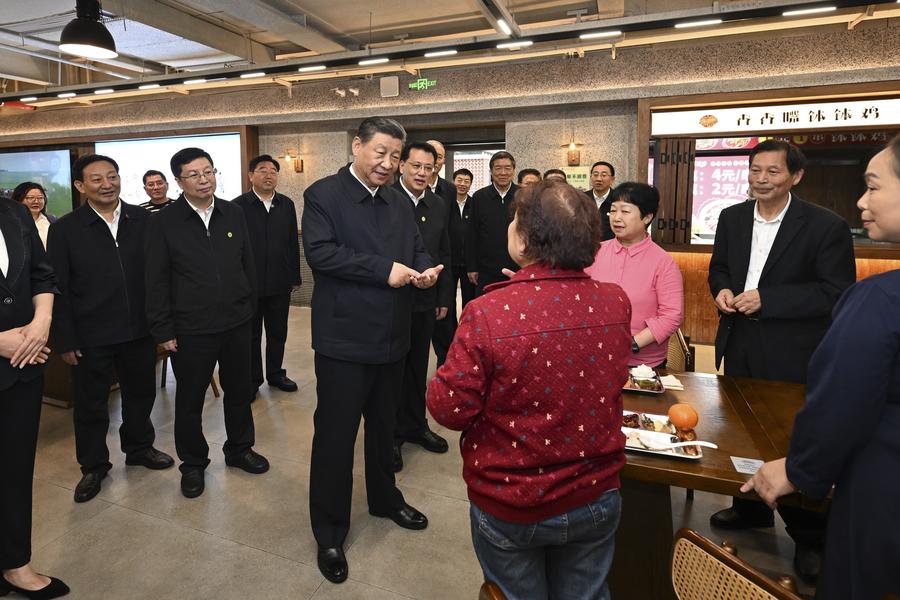 Chinese President Xi Jinping, also general secretary of the Communist Party of China Central Committee and chairman of the Central Military Commission, visits a community in Jiulongpo District in southwest China's Chongqing Municipality, April 22, 2024. /Xinhua
