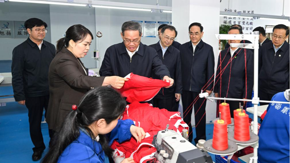 Chinese Premier Li Qiang visits a workshop at a local residential community in Kaili City, southwest China's Guizhou Province, April 24, 2024. /Xinhua