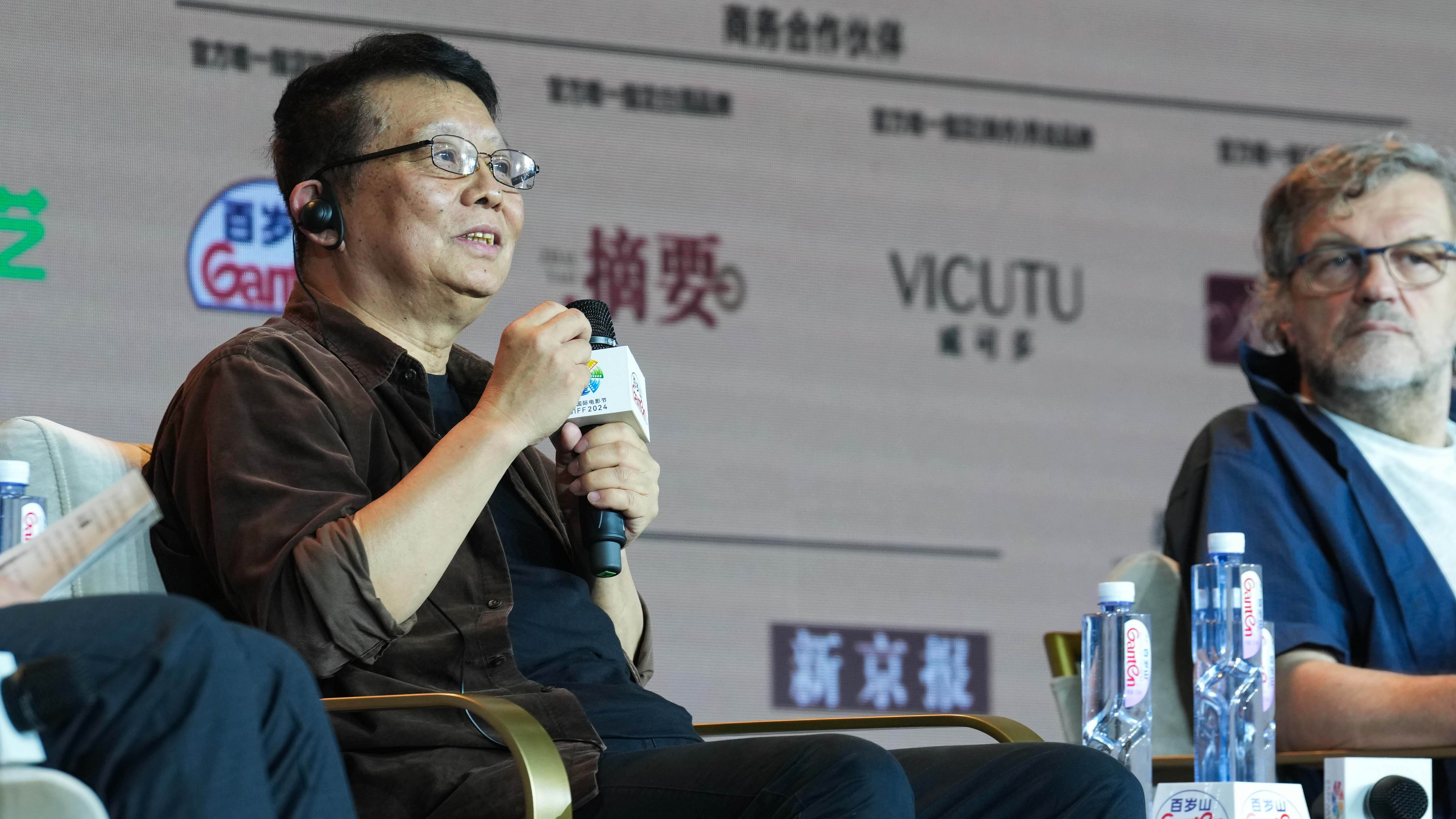 Chinese filmmaker Huang Jianxin shared his insights as a guest speaker at Emir Kusturica Workshop and Masterclass, Beijing, China, April 25, 2024. Chen Bo/CGTN 