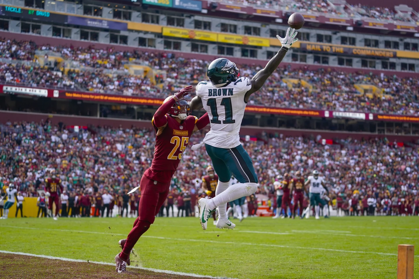 Wide receiver A.J. Brown (#11) of the Philadelphia Eagles catches the ball to score a touchdown in the game against the Washington Commanders at Commanders Field in Landover, Maryland, October 29, 2023. /AP
