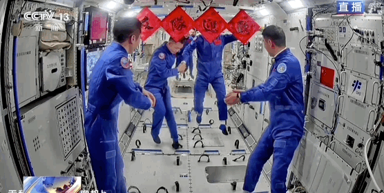 The Shenzhou-17 crew welcome the Shenzhou-18 crew in the space station. /China Media Group