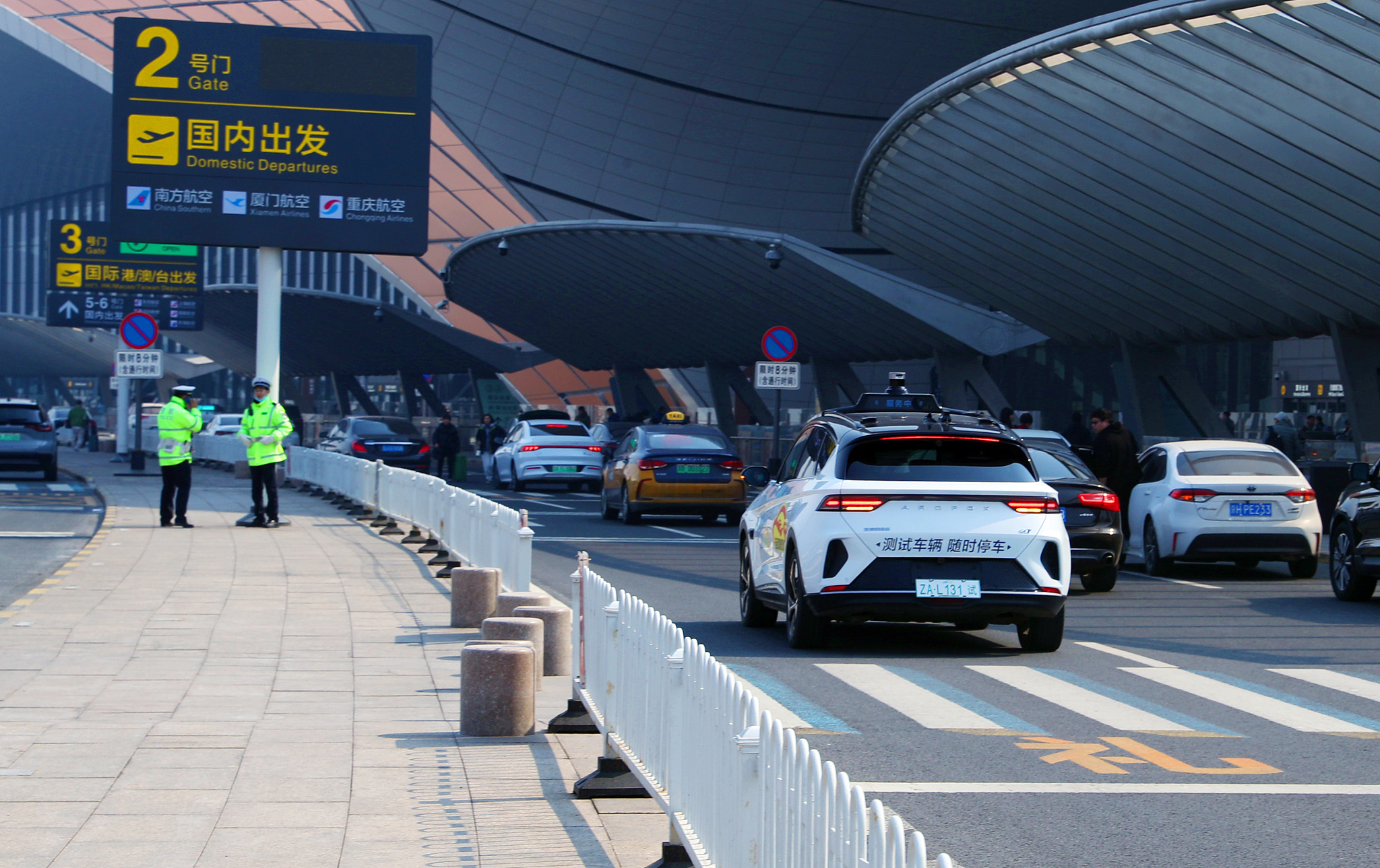 Taxis park outside the Beijing Daxing International Airport in Beijing, China, March 7, 2024. /CFP