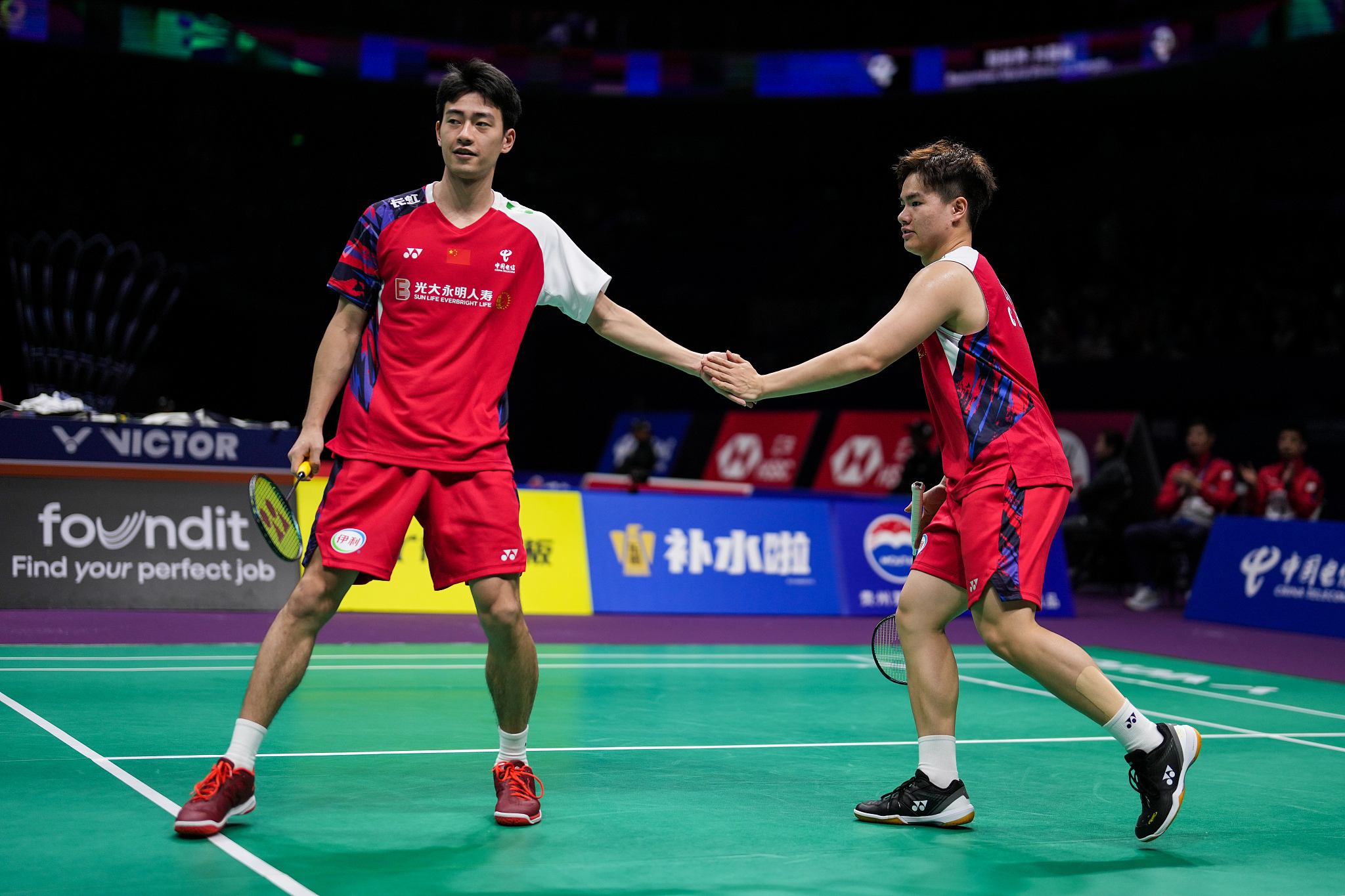 China's Wang Chang (L) and Liang Weikeng during day two of the Thomas & Uber Cup Finals 2024 at Chengdu High-tech Sports Center in Chengdu, China, April 28, 2024. /CFP