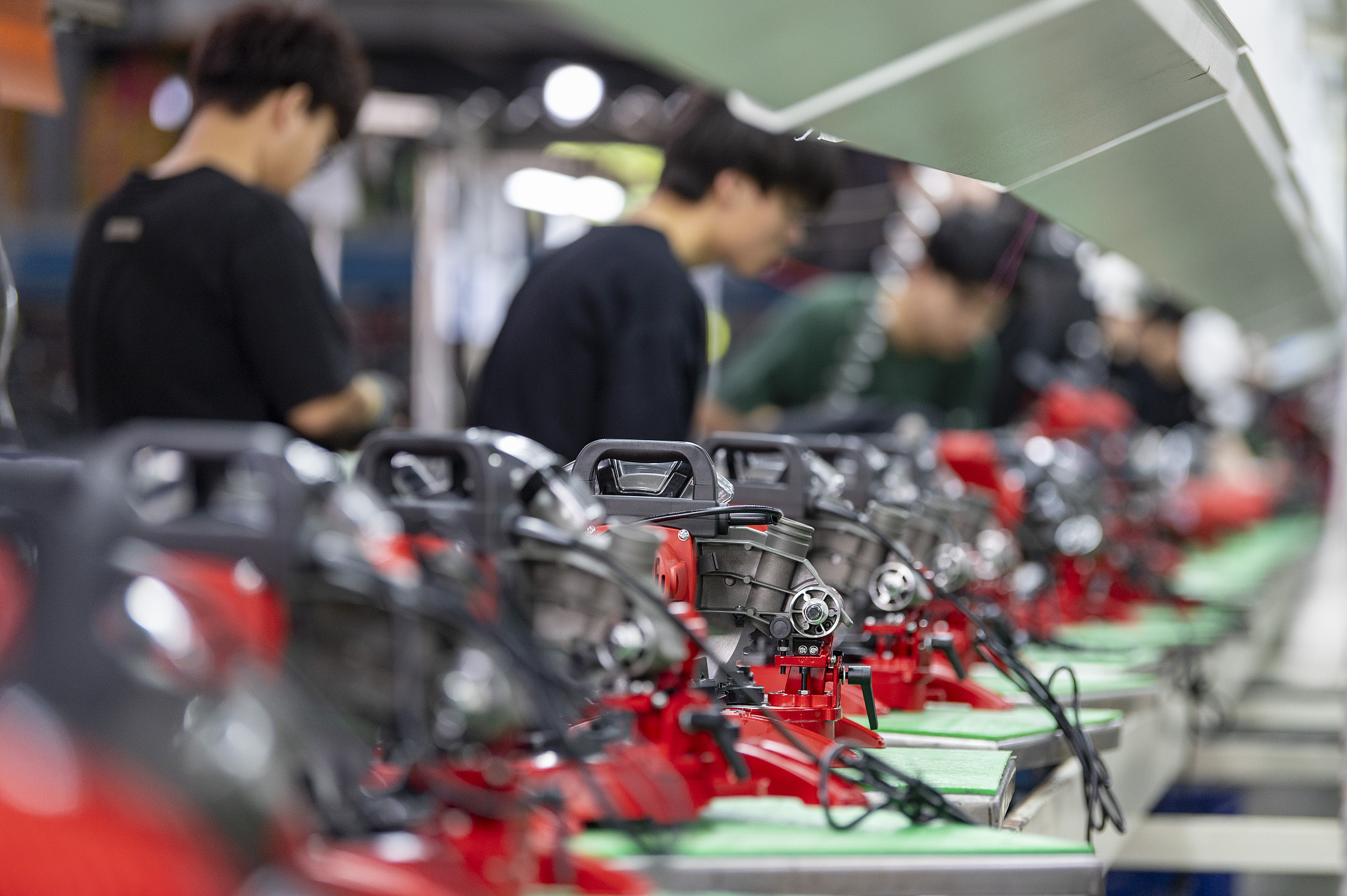 Workers assembling power tool products in Jinhua, east China's Zhejiang Province, April 29, 2024. /CFP