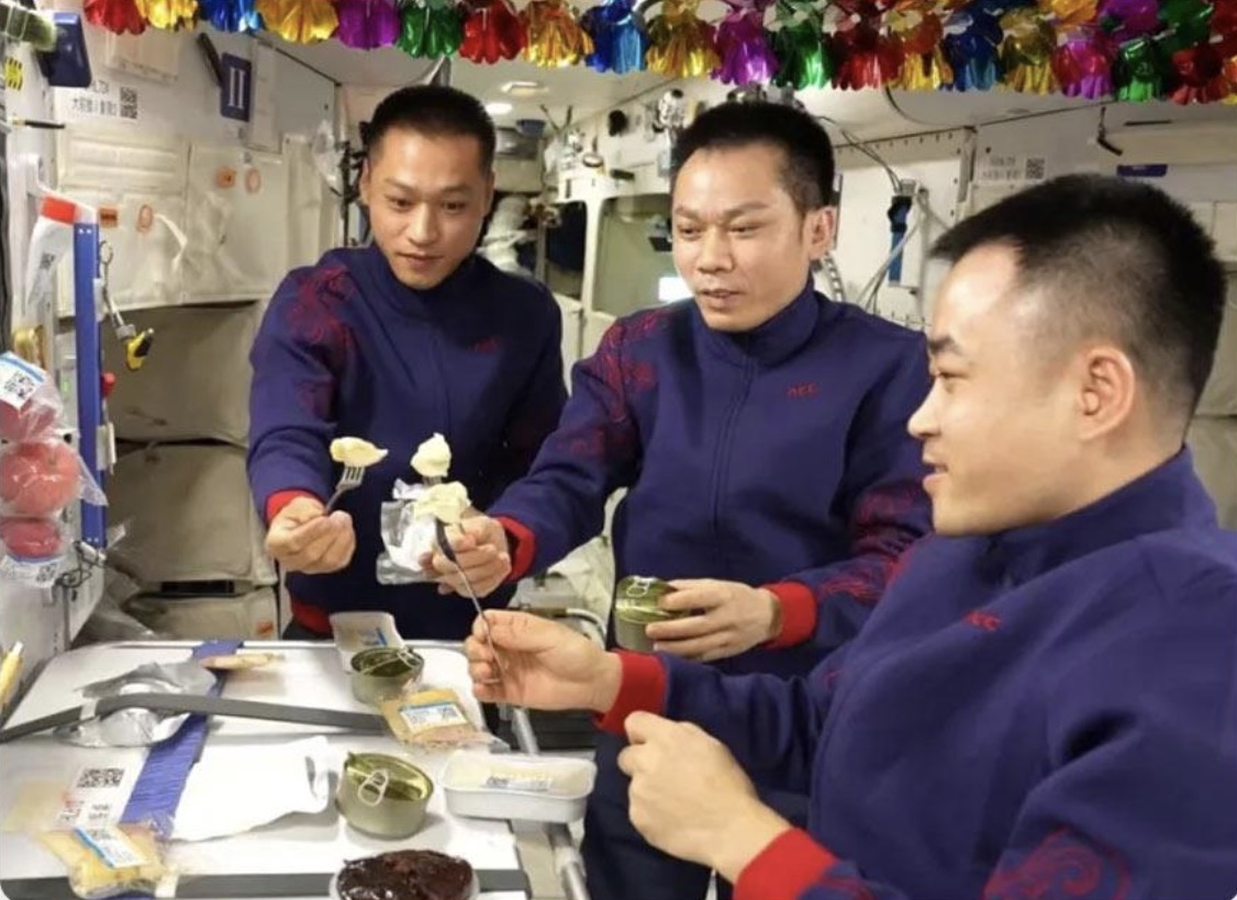 The Shenzhou-17 crew eat Chinese dumplings (Jiaozi) to celebrate the 2024 Chinese New Year in space. /CMG