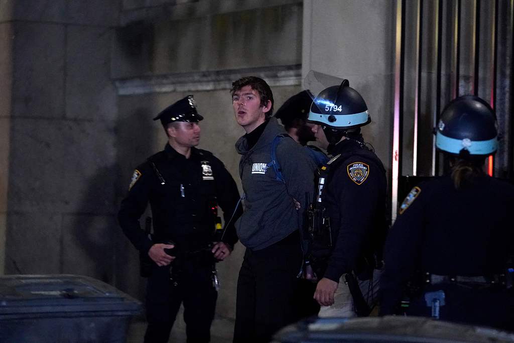 NYPD officers arrest a student at Columbia University in New York City on April 30, 2024. /CFP
