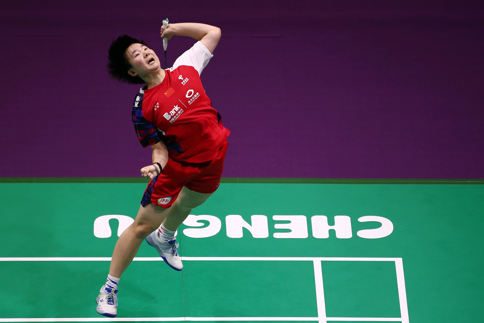 He Bingjiao of China jumps to save a shot in the third-round women's singles match during the Uber Cup quarterfinal in Chengdu, China, May 2, 2024. /CFP