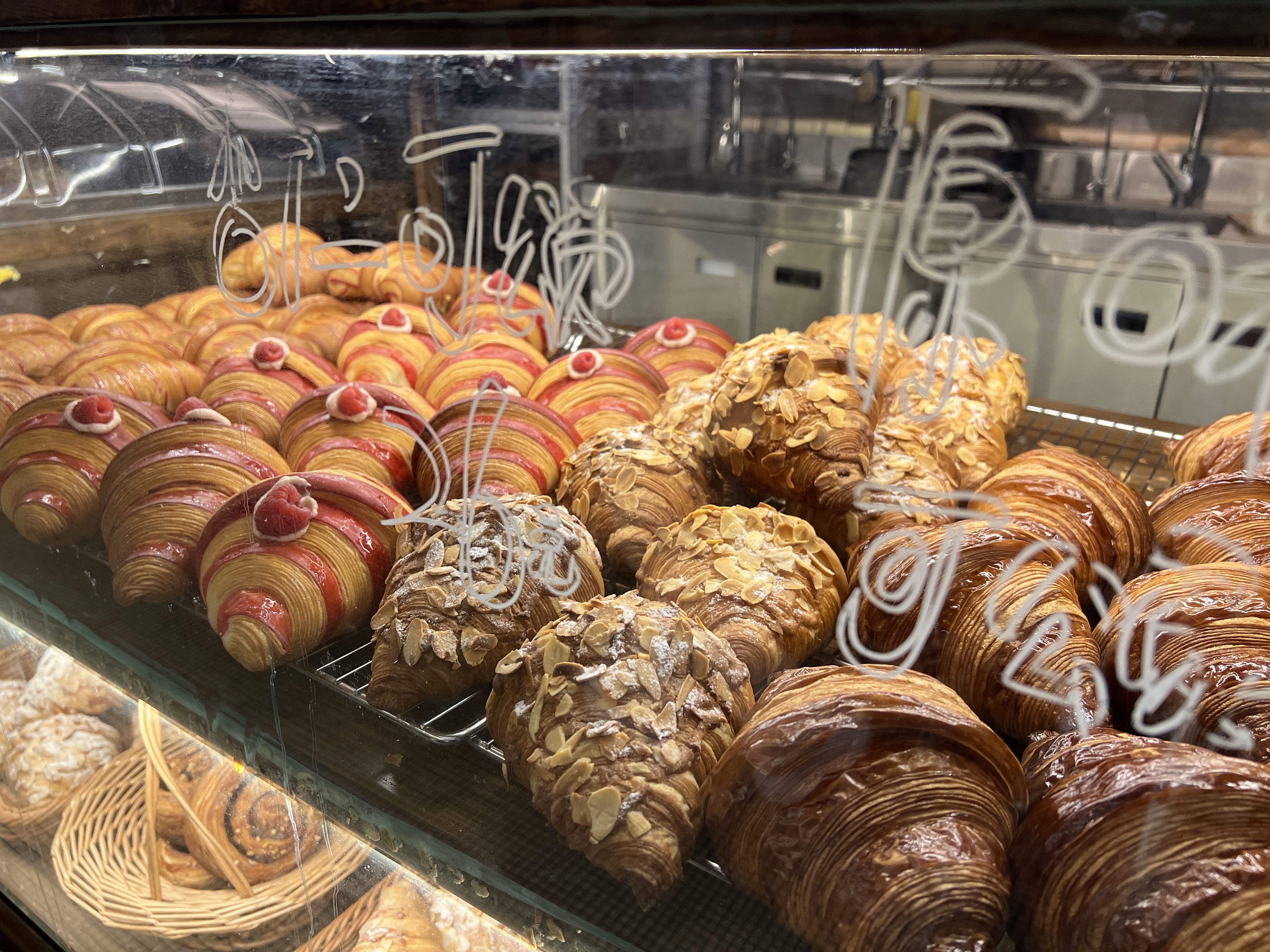 A selection of traditional and trendy croissants at Bingoo Bakery in Beijing on April 26, 2024. /CGTN