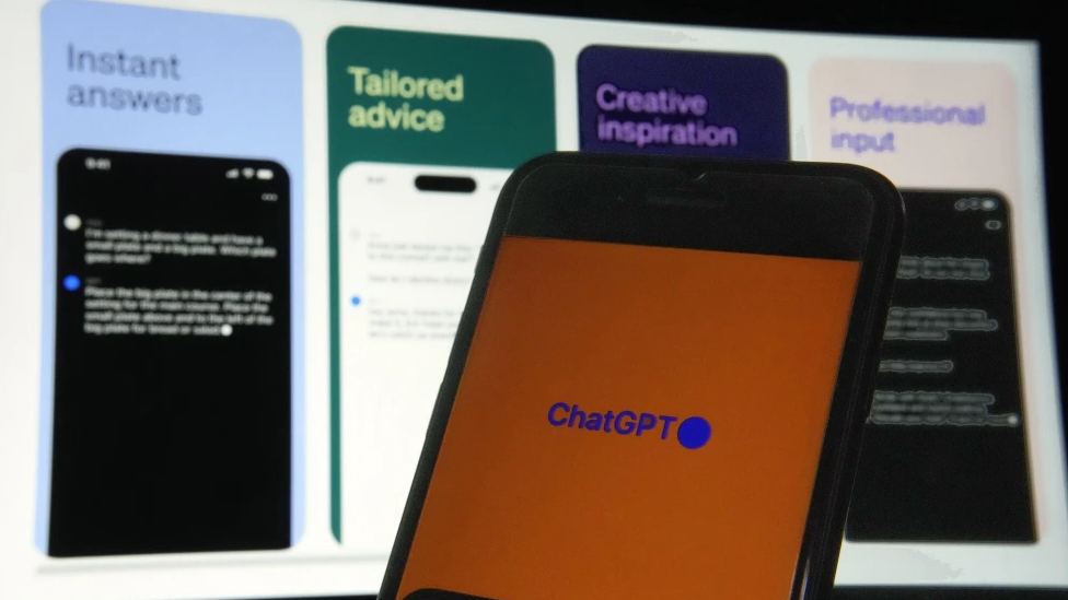 OpenAI's ChatGPT app is displayed on an iPhone. /AP