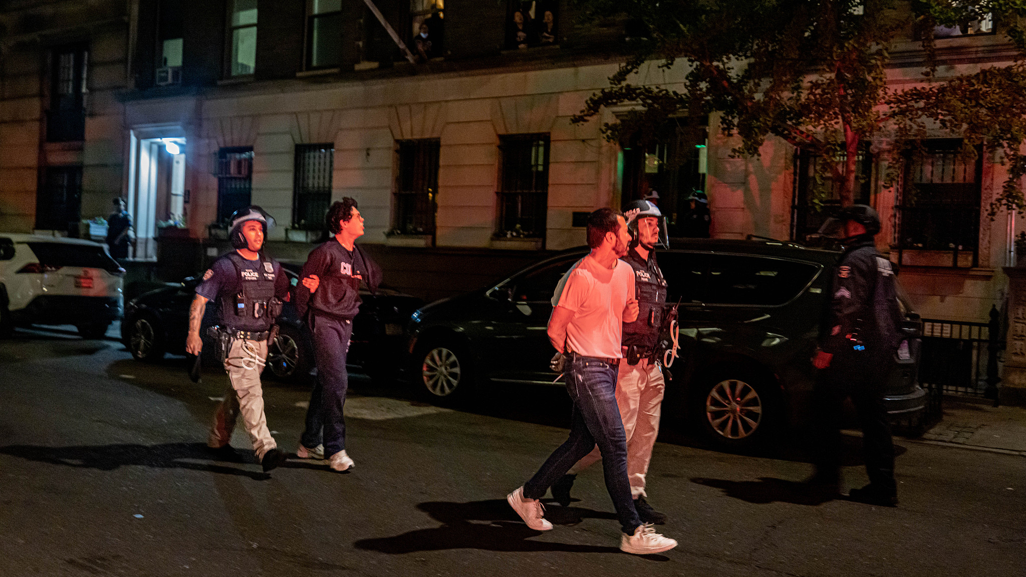 Members of the NYPD detain protesters from the pro-Palestinian protest encampment near Hamilton Hall where demonstrators barricaded themselves inside Columbia University in New York City, U.S., April 30, 2024. /CFP
