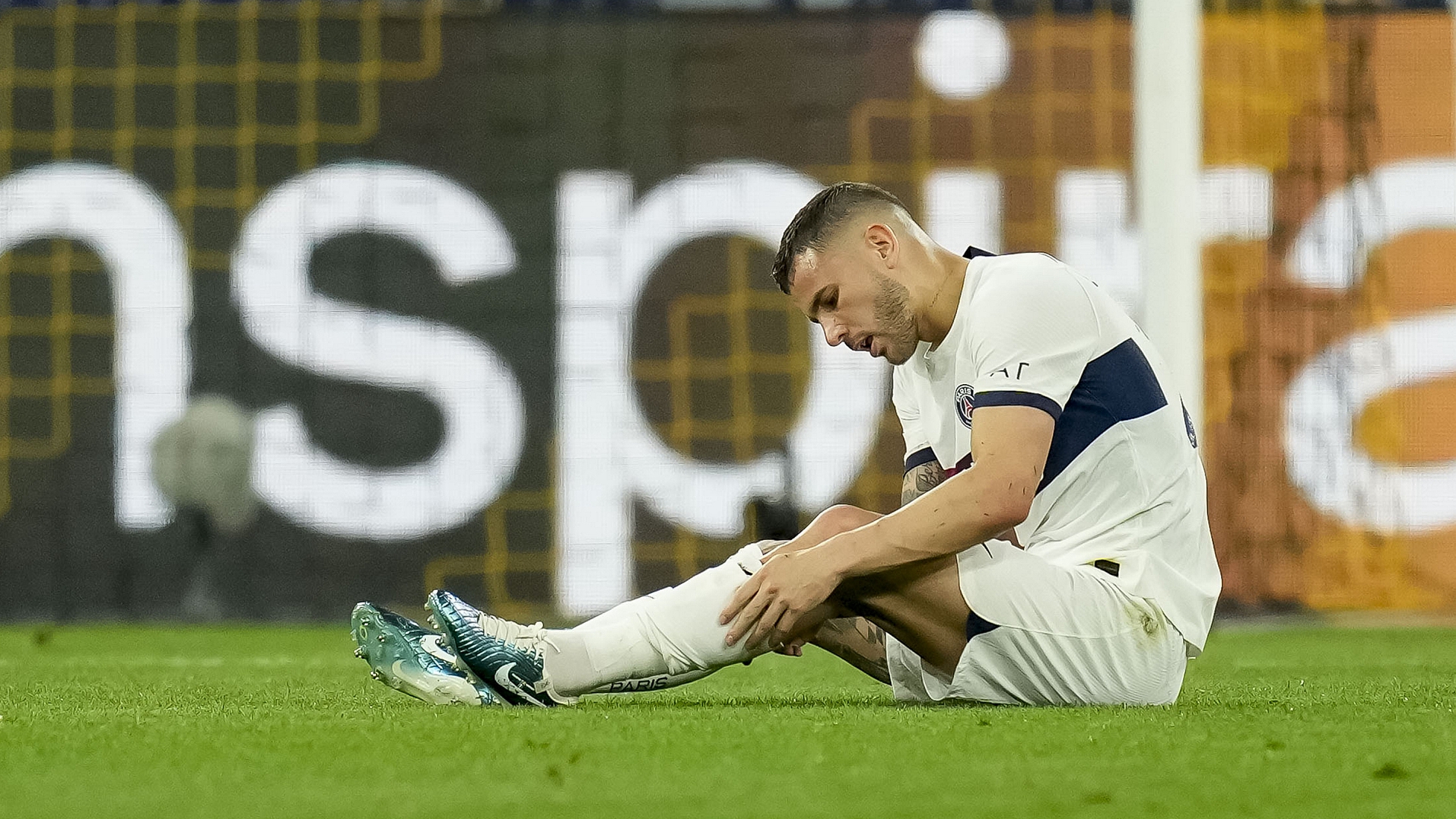 Lucas Hernandez of Paris Saint-Germain on the ground during a clash with Borussia Dortmund at Signal Iduna Park in Dortmund, Germany, May 1, 2024. /CFP