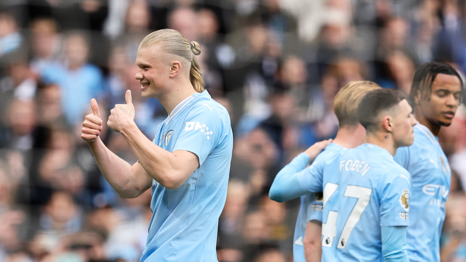 Erling Haaland (L) of Manchester City celebrates scoring his side's first goal during the Premier League match against Wolverhampton Wanderers in Manchester, UK, May 4, 2024. /CFP