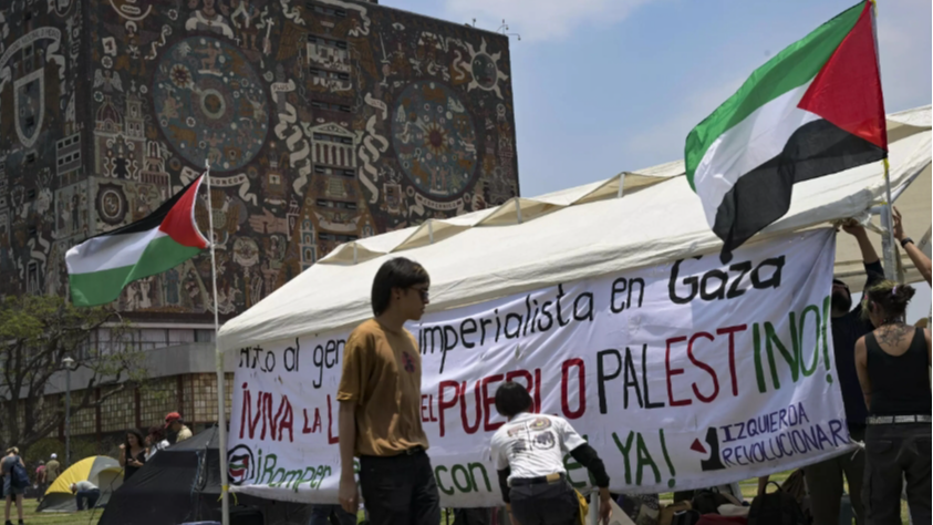 Activists erect a tent in front of the rectory building of Universidad Nacional Autónoma de México as part of a camp to protest Israel's attacks on the Gaza Strip in Mexico City, Mexico, May 2, 2024. /AFP