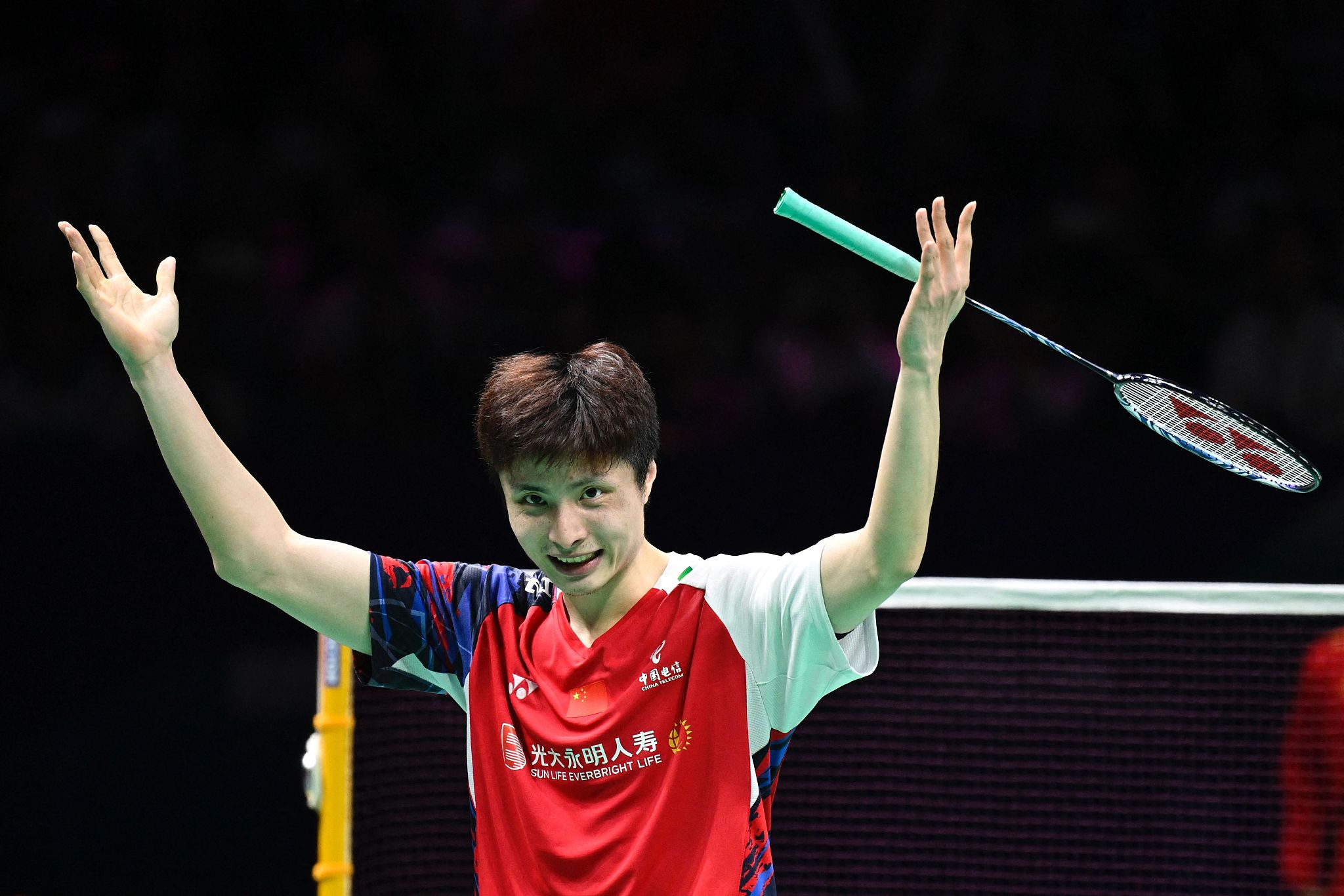 China's Shi Yuqi reacts after his victory against Indonesia's Anthony Sinisuka Ginting during the Thomas and Uber Cup badminton tournament in Chengdu, China, May 5, 2024. /CFP