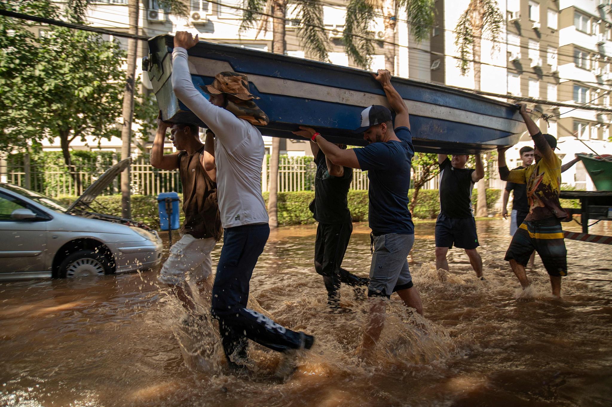 People take part in rescue operations in Porto Alegre, Brazil, on May 6, 2024. /CFP