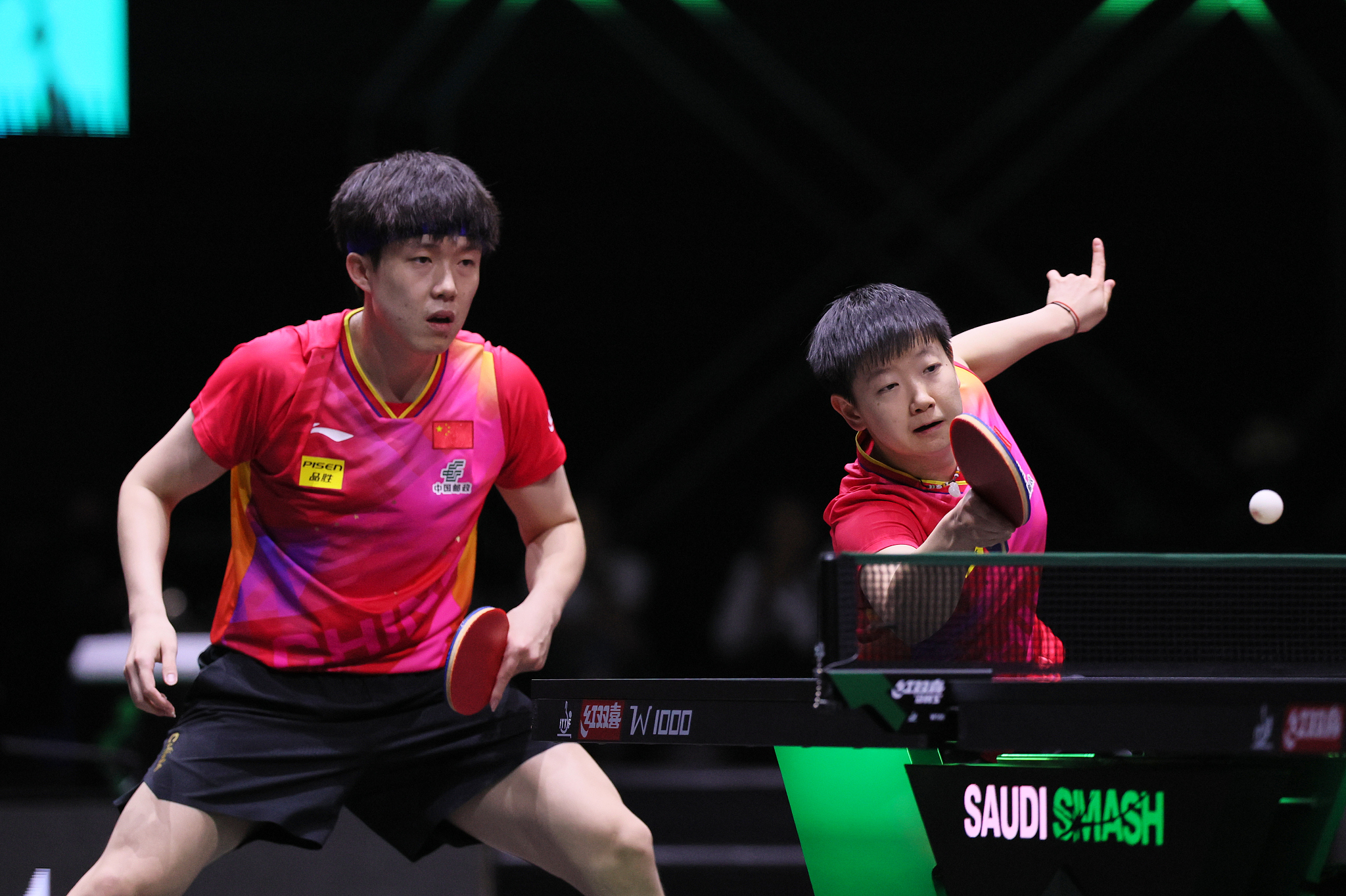 China's Wang Chuqin (L) and Sun Yingsha in action during their mixed doubles match at the WTT Saudi Smash in Jeddah, Saudi Arabia, May 6, 2024. /CFP