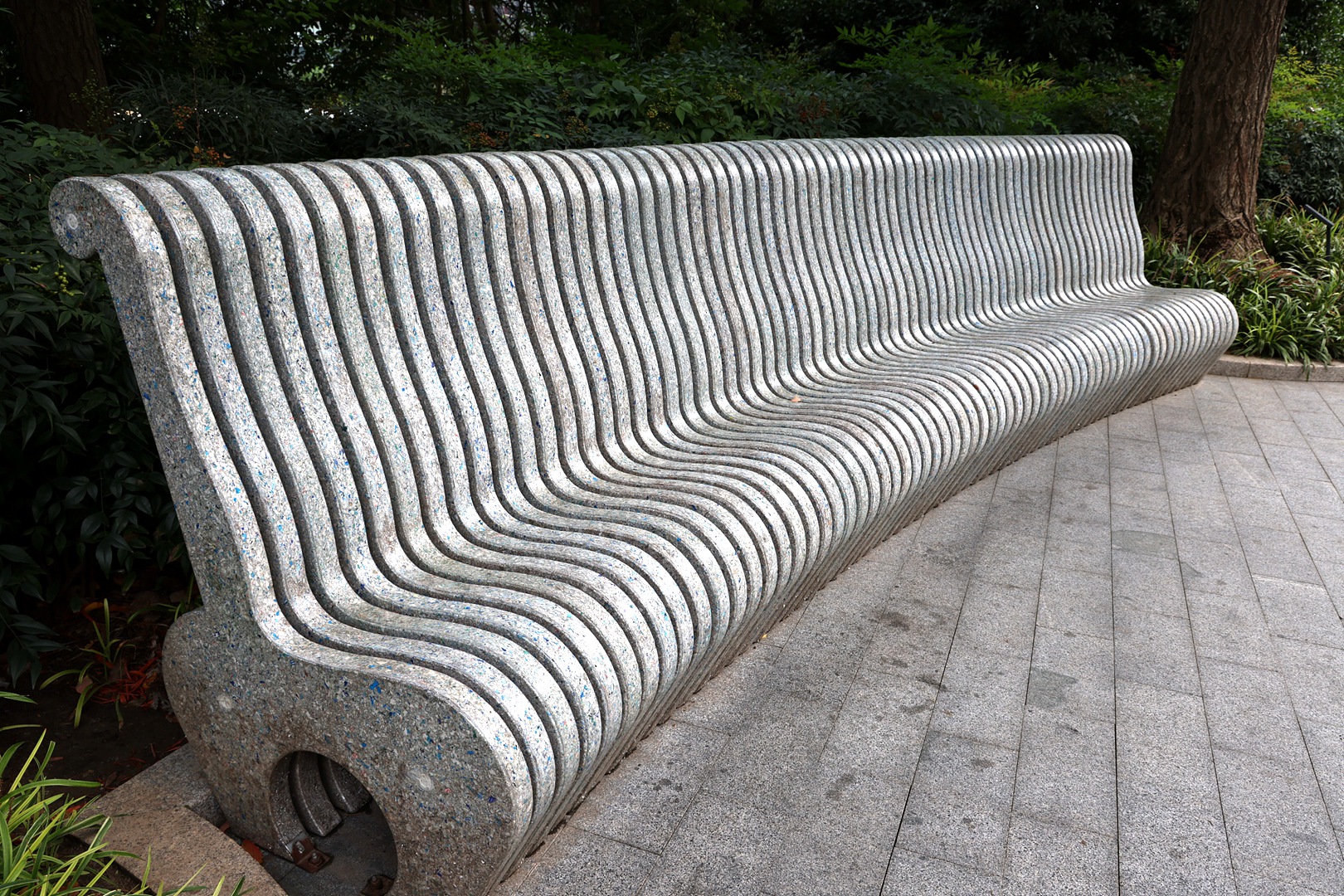 A 5-meter-long environmental bench made of approximately 1,540 kilograms of materials, including 160,000 recycled milk cartons, Shanghai, east China, October 14, 2023. /CFP
