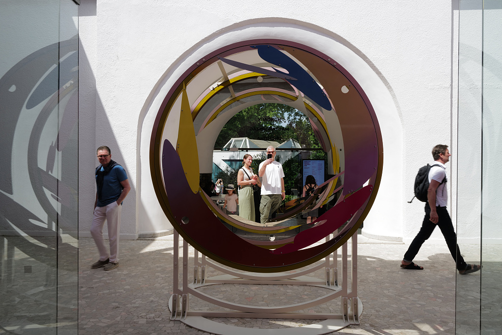 Visitors attend the exhibition at the Hungary Pavilion during the 60th Venice Biennale on May 1, 2024 in Venice, Italy. /CFP