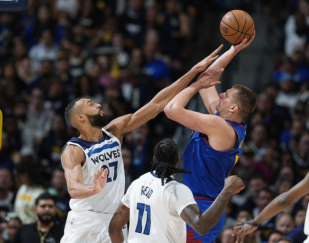 Rudy Gobert (#27) of the Minnesota Timberwolves deflects a shot by Nikola Jokic of the Denver Nuggets in Game 1 of the NBA Western Conference semifinals at Ball Arena in Denver, Colorado, May 4, 2024. /CFP