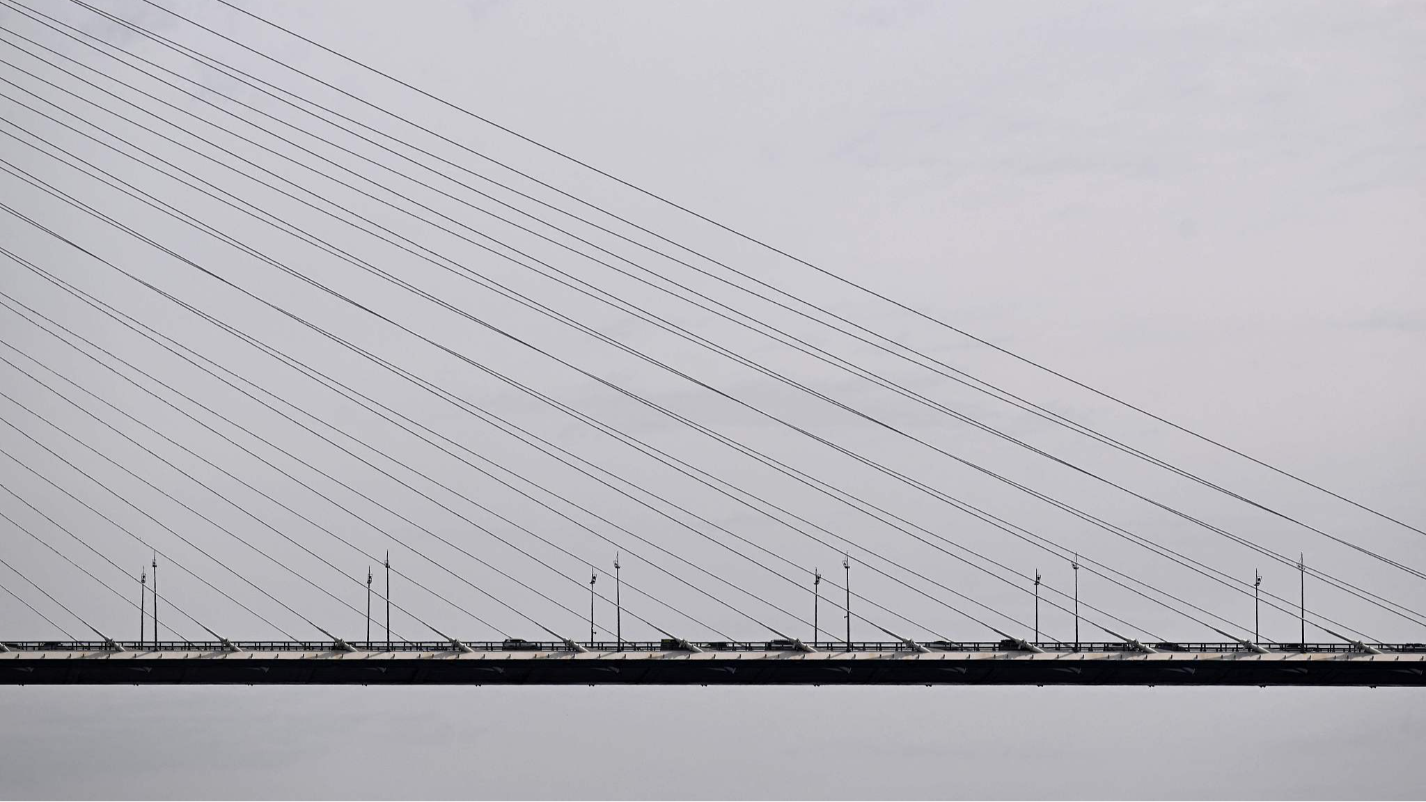 Cars drive across the Zolotoy (Golden) Bridge in Vladivostok, Russia,  September 13, 2023. /CFP