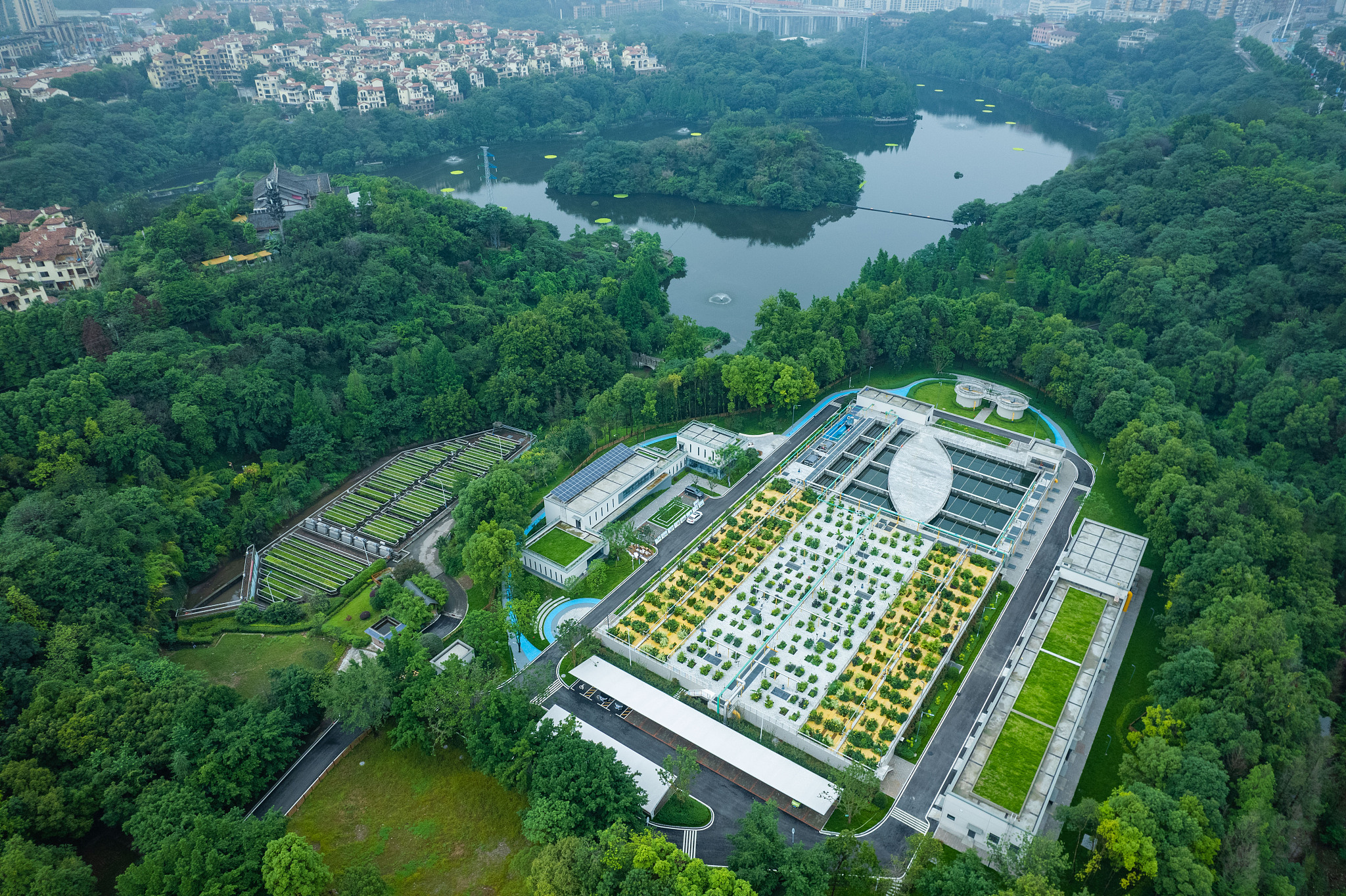 An aerial view of Caiyun Lake sewage treatment plant in southwest China's Chongqing Municipality, June 17, 2024. /VCG