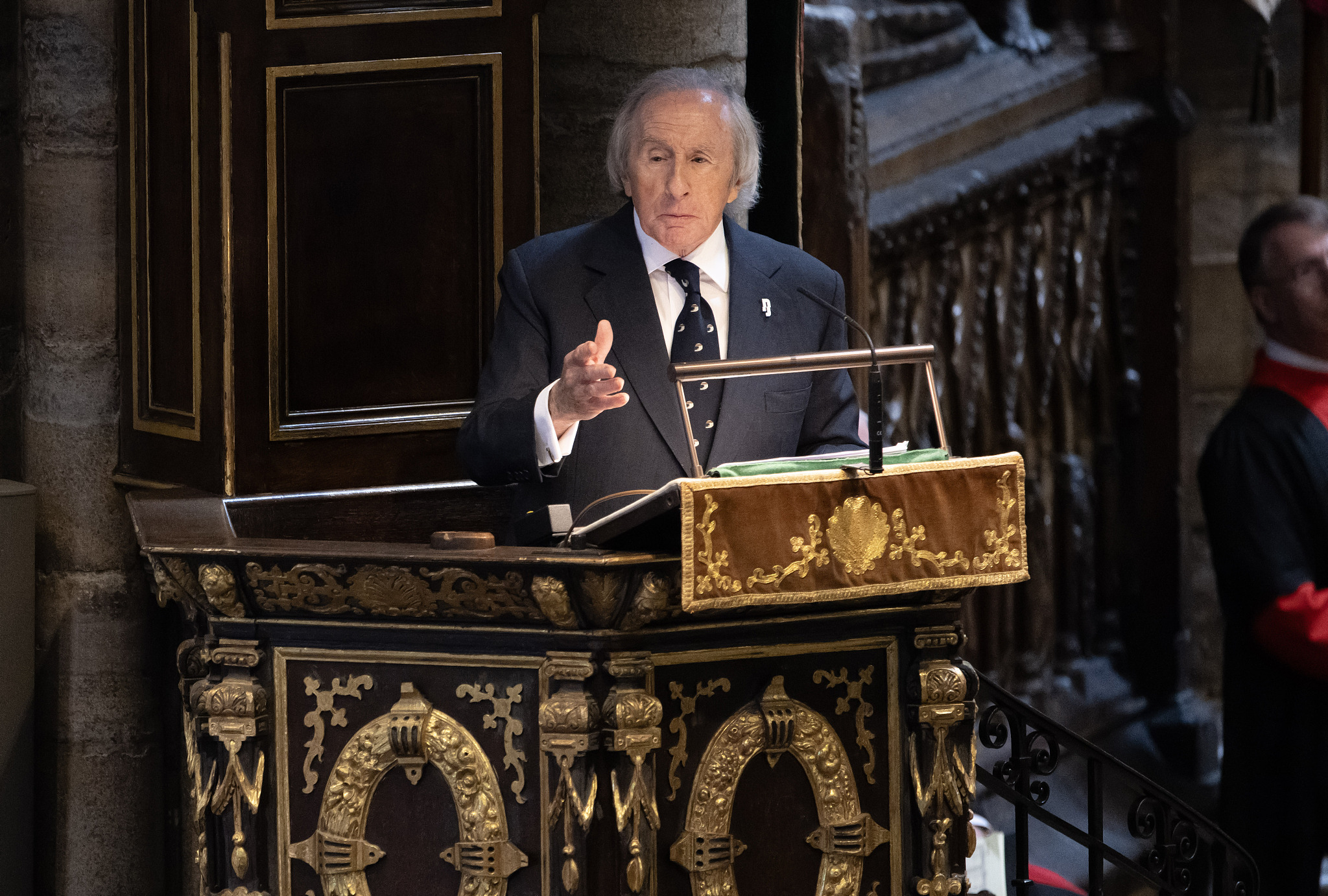 Jackie Stewart gives a reading during a Service of Thanksgiving for Sir Stirling Moss at Westminster Abbey in London, England, May 8, 2024. /CFP