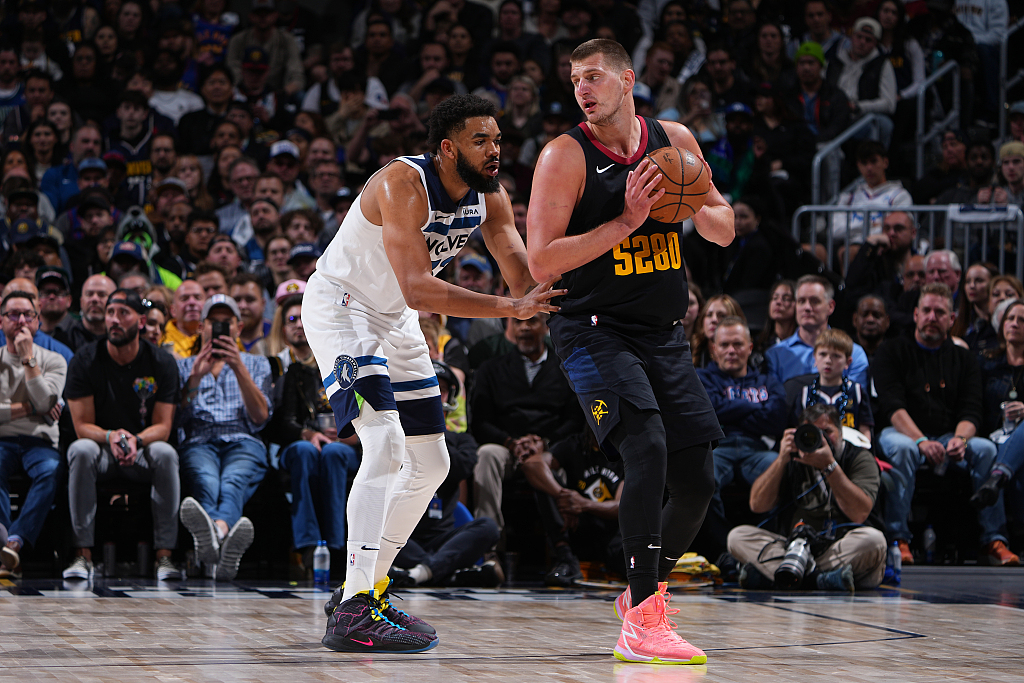 Nikola Jokic (R) of the Denver Nuggets posts up in Game 2 of the NBA Western Conference semifinals against the Minnesota Timberwolves at Ball Arena in Denver, Colorado, May 2, 2024. /CFP