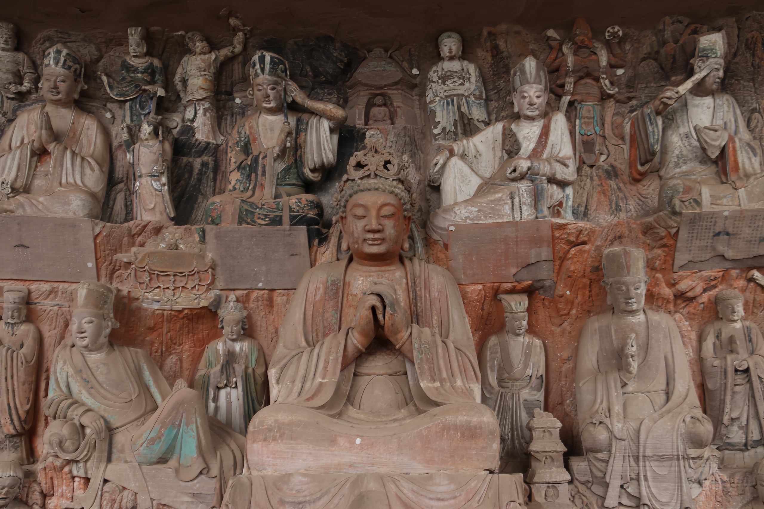 Statues of Buddha are pictured at the Pilu Cave in Anyue County, Sichuan Province. /IC 