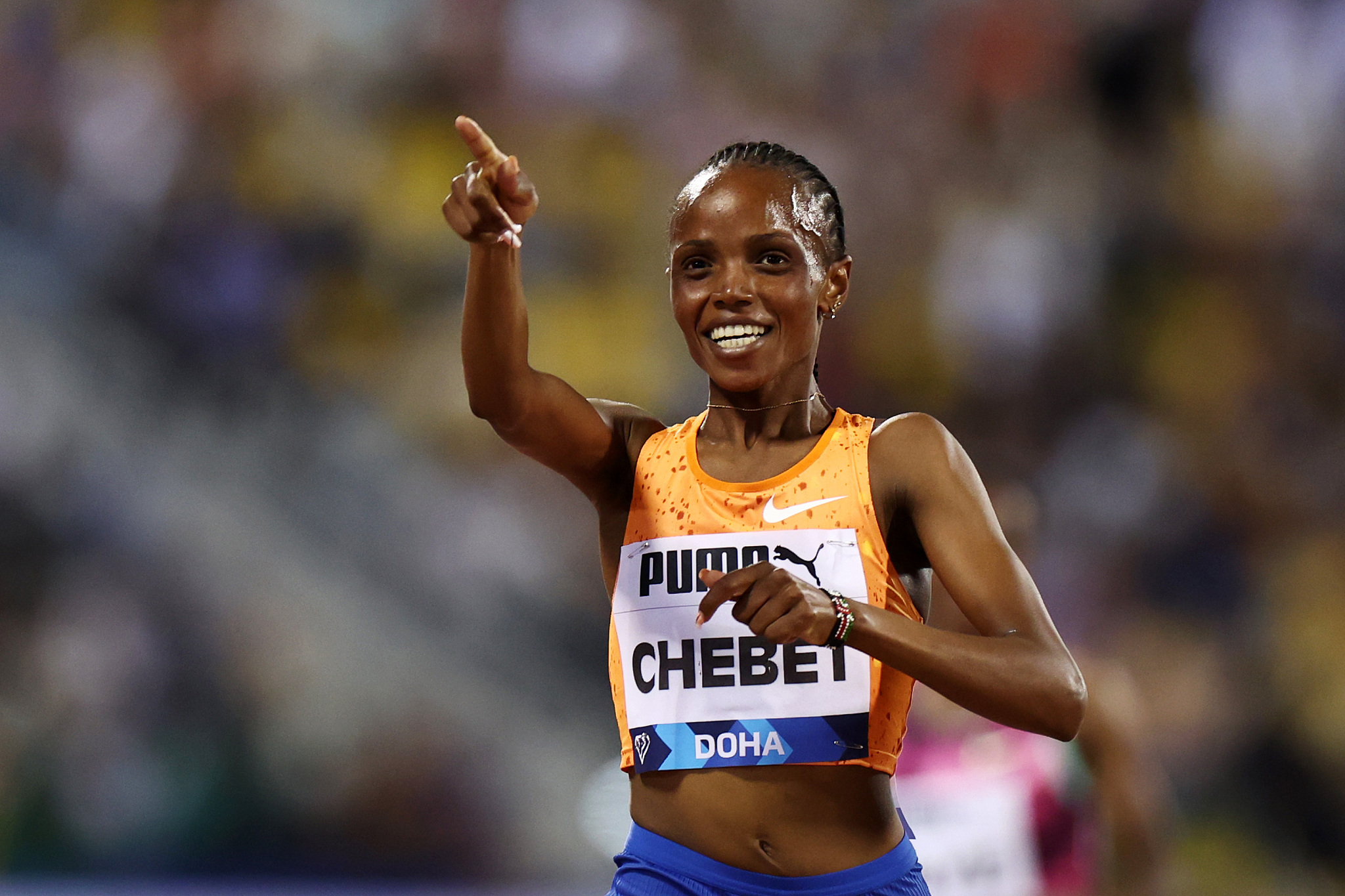 Beatrice Chebet of Kenya celebrates after winning women's 5000m during the Diamond League competition in Doha, Qatar, May 10, 2024. /CFP