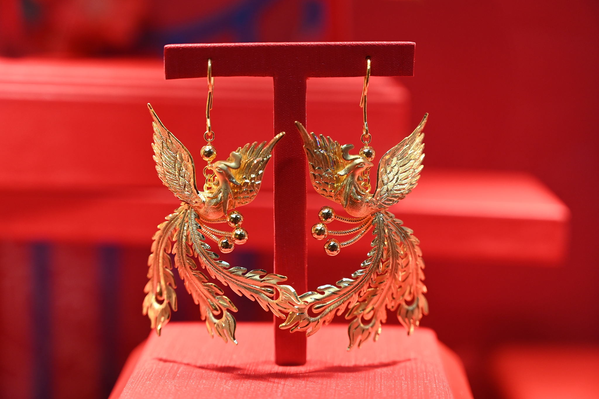Gold jewelry and gold wedding items on display at the 2024 China Arts & Crafts Expo in Fuzhou, Fujian Province on May 9, 2024. /CFP