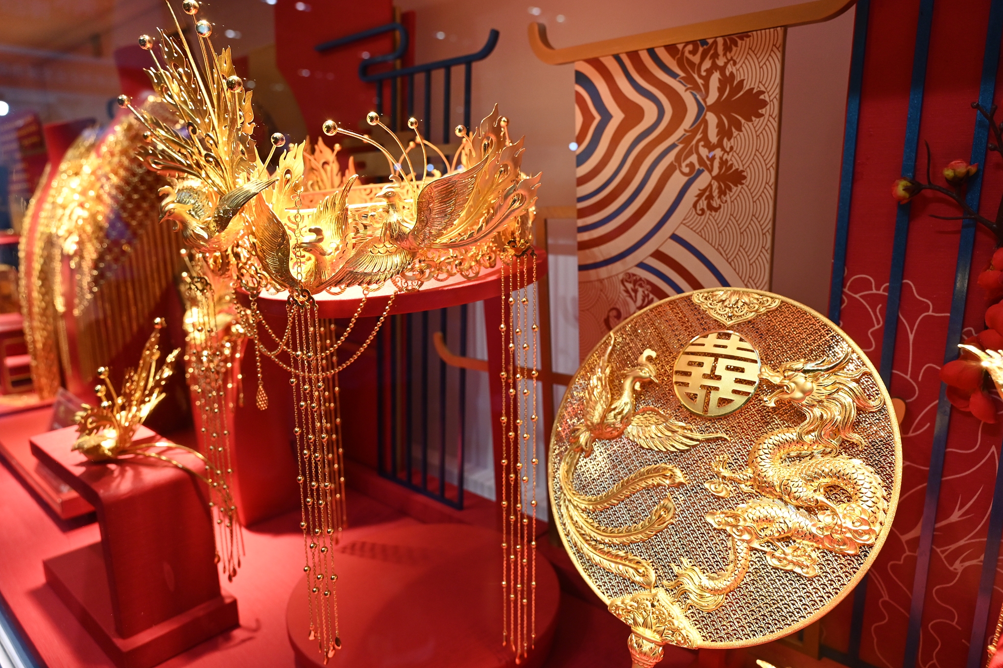 Gold jewelry and gold wedding items on display at the 2024 China Arts & Crafts Expo in Fuzhou, Fujian Province on May 9, 2024. /CFP