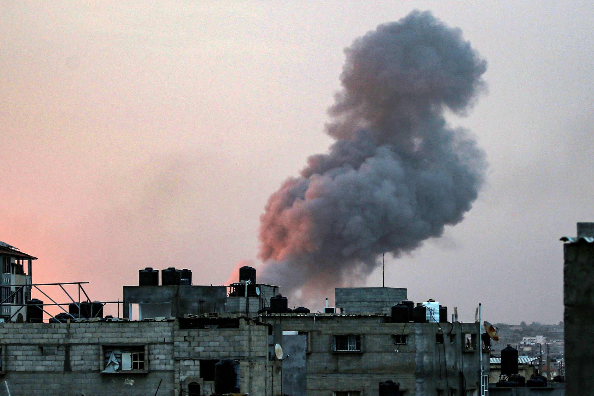 Smoke rises above buildings during an early morning Israeli strike on Rafah in southern Gaza, May 11, 2024. /CFP