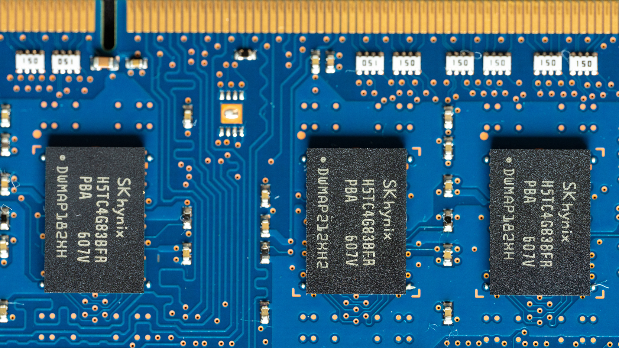 The memory chips made by South Korean semiconductor supplier SK Hynix are seen on a circuit board of a computer, March 25, 2024. /CFP