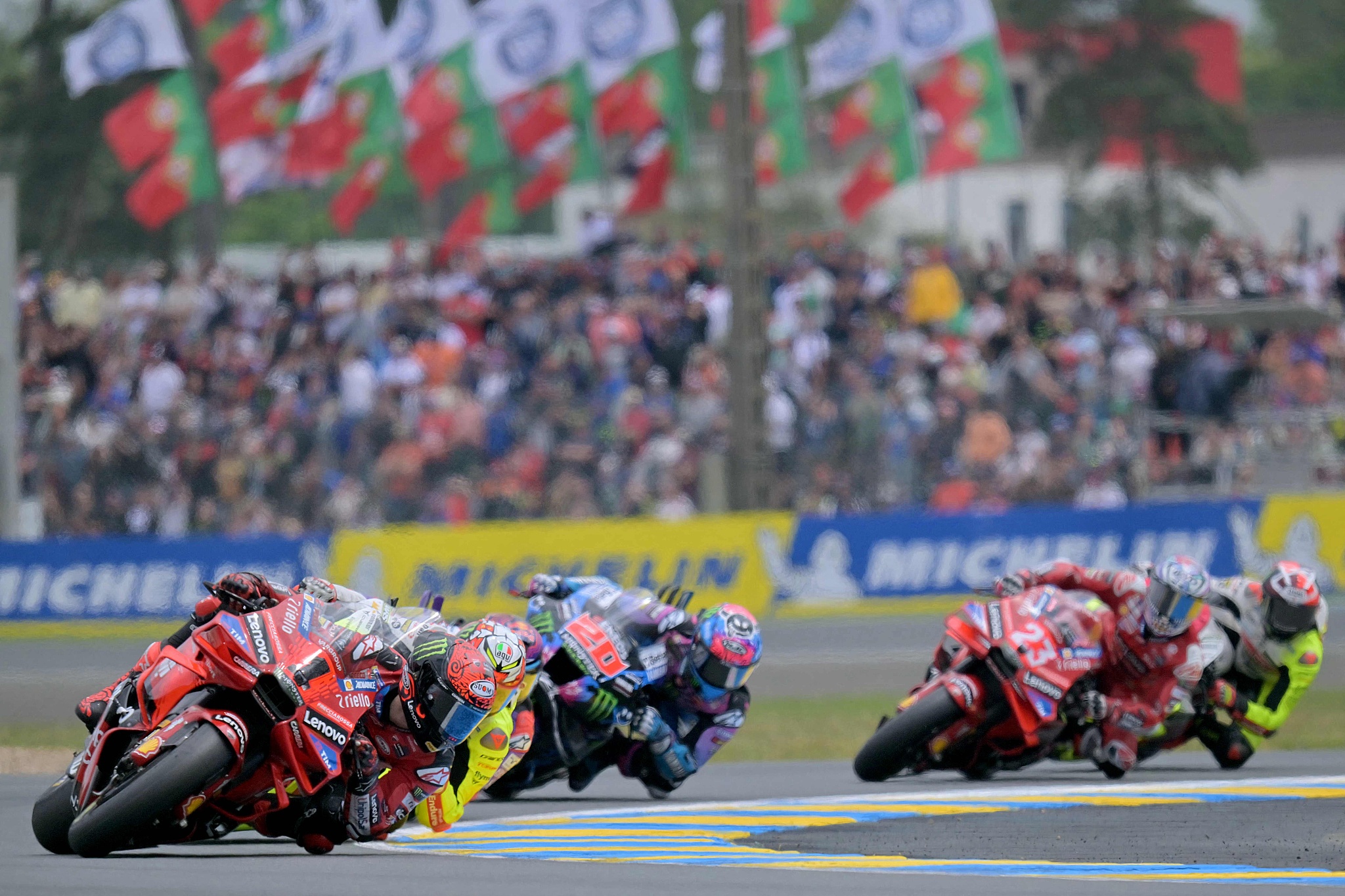 Riders take a corner during the French MotoGP at the Bugatti circuit in Le Mans, France, May 12, 2024. /CFP